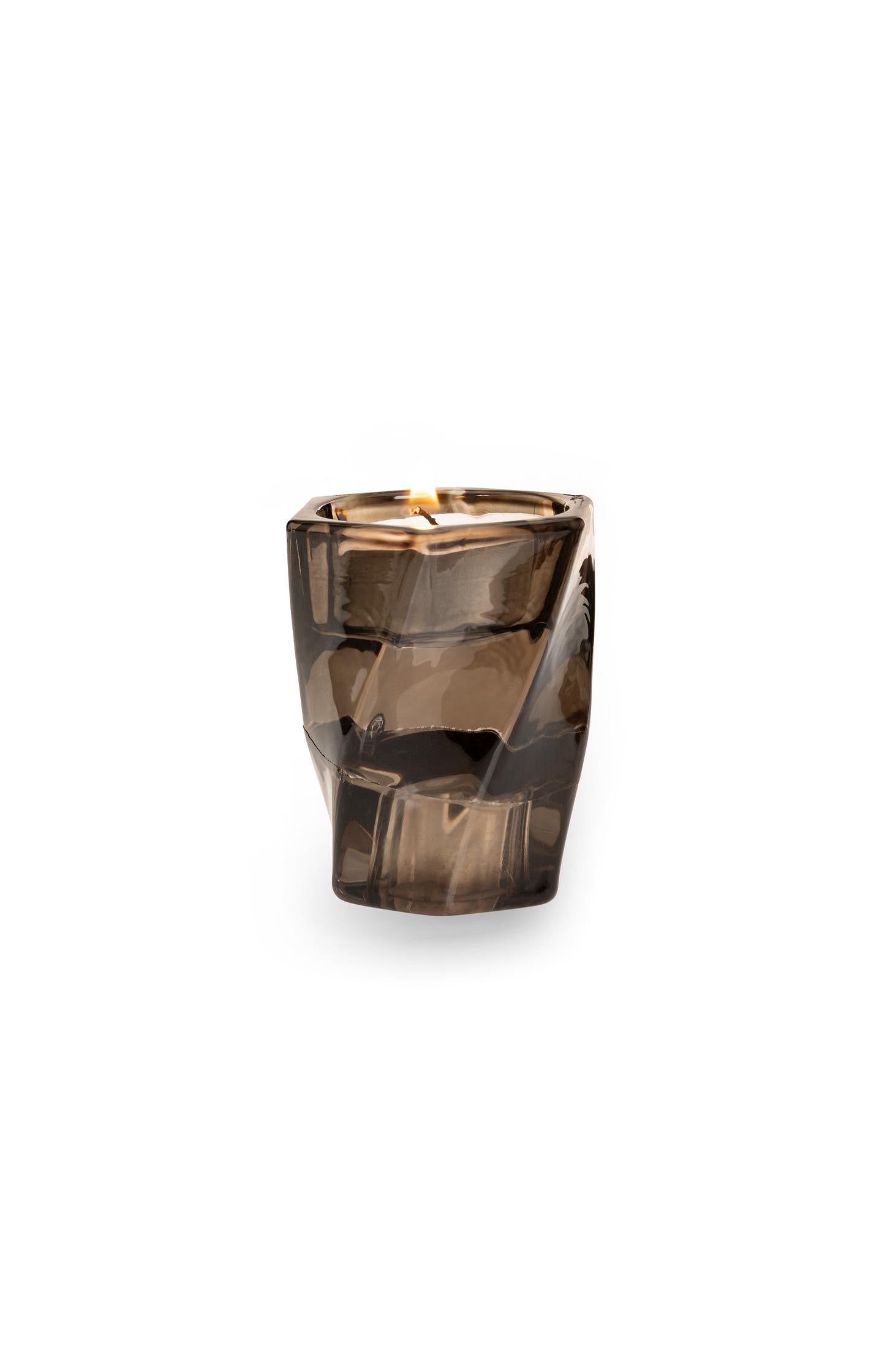 Glass candle holder with swirl design