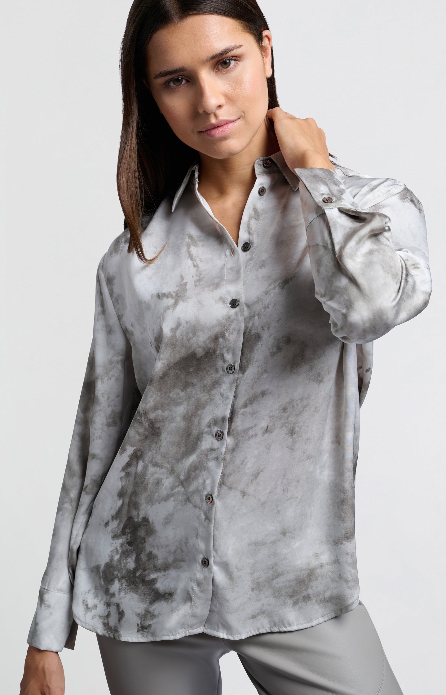 Grey blouse with abstract print and button closure