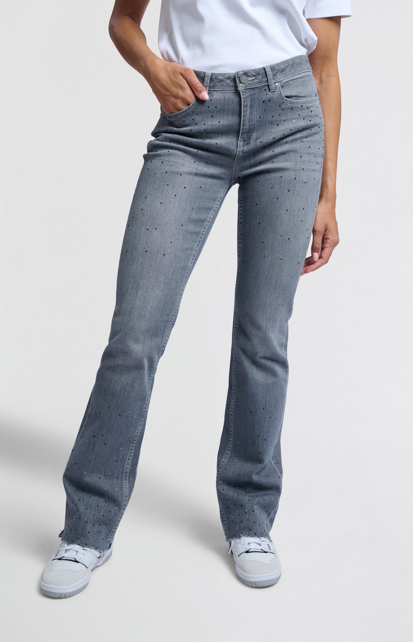 Grey flared denim jeans with rhinestones and high waist