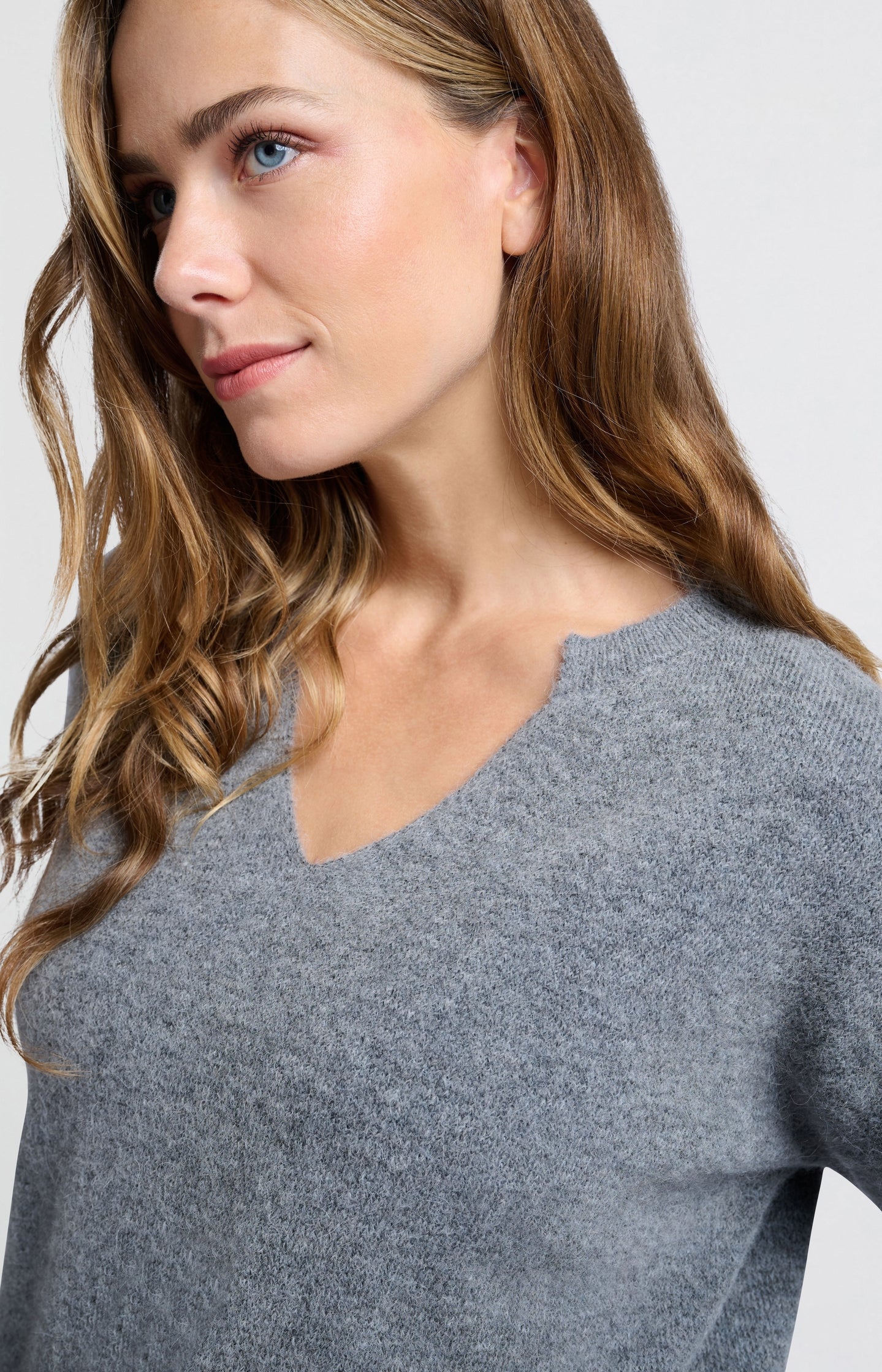 Grey sweater with V neck and long sleeves