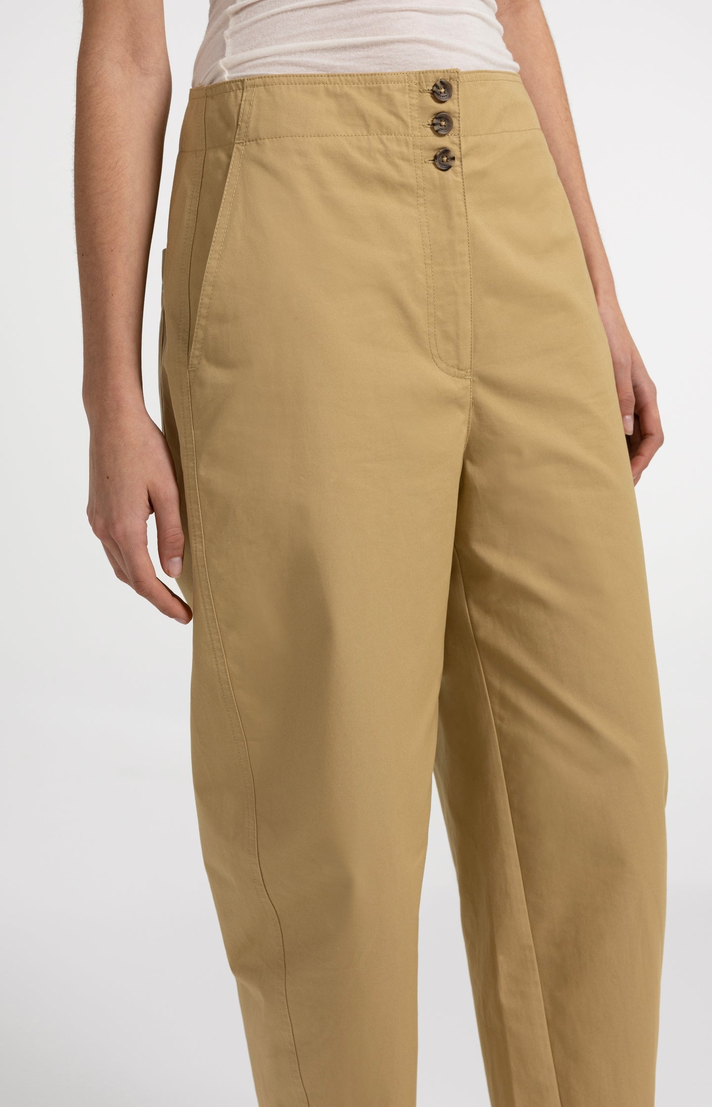 High-waist barrel-leg trousers with button detail