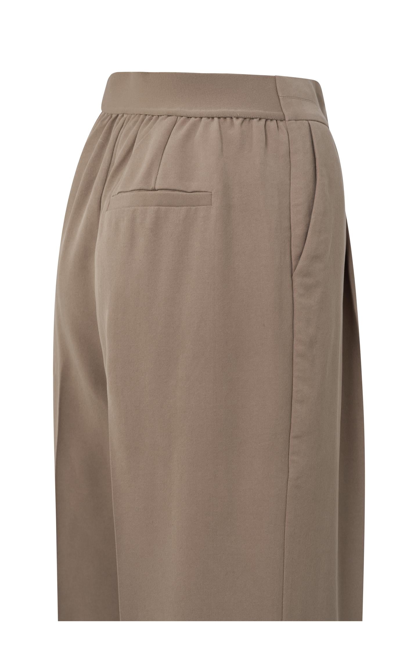 High waist trouser with wide leg, side pockets and zip fly