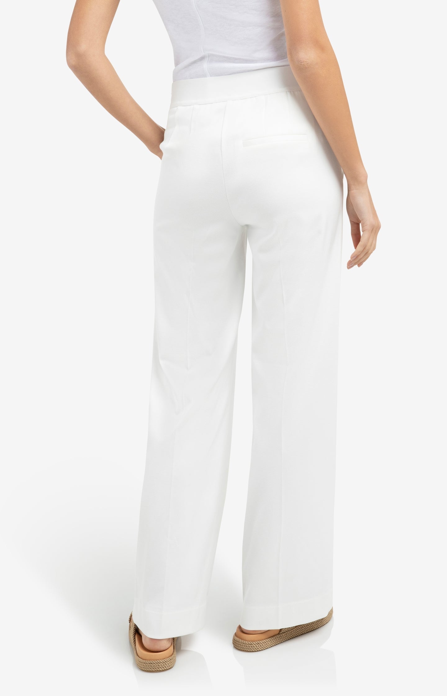 High waist trousers with decorative buttons and wide legs