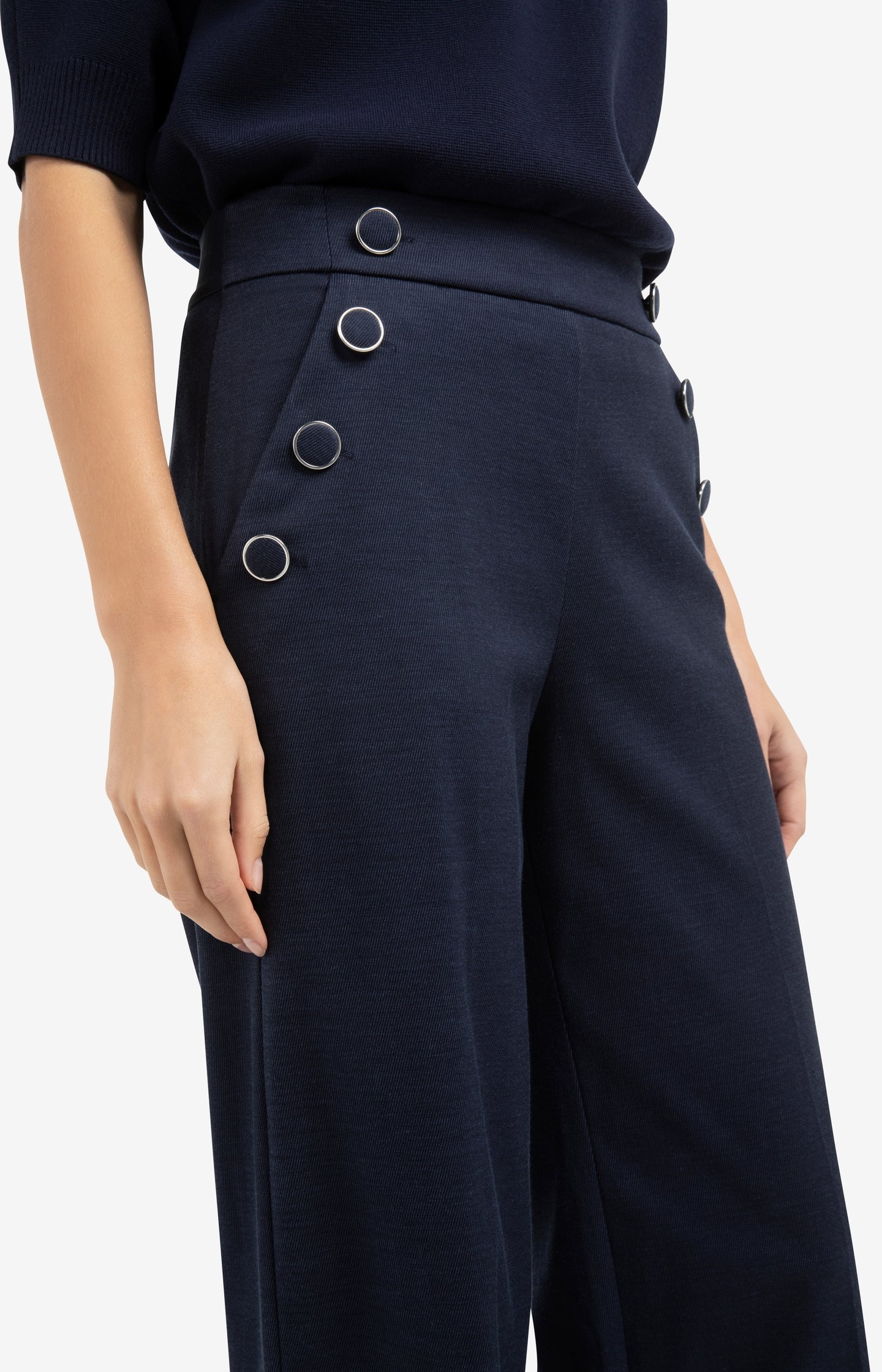 High waist trousers with decorative buttons and wide legs