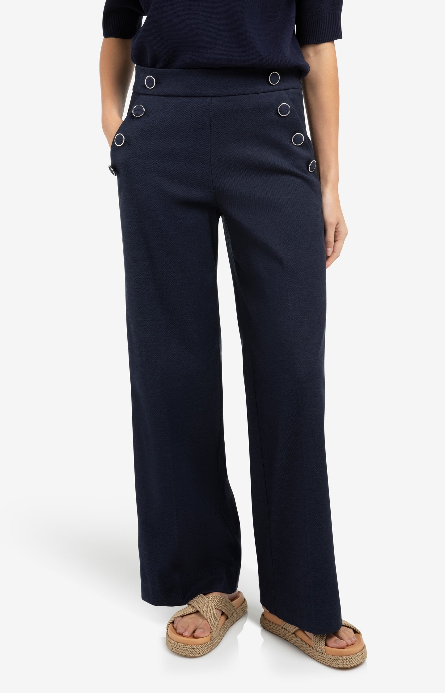 High waist trousers with decorative buttons and wide legs