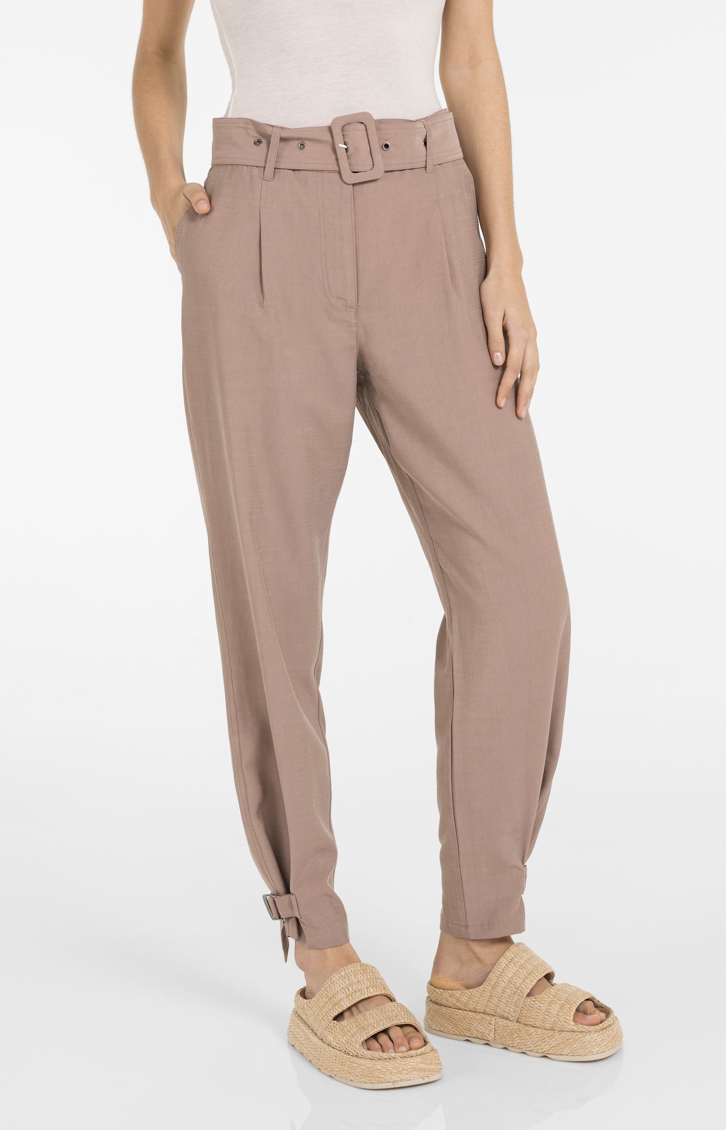 High waist trousers with strap details at the bottom hem