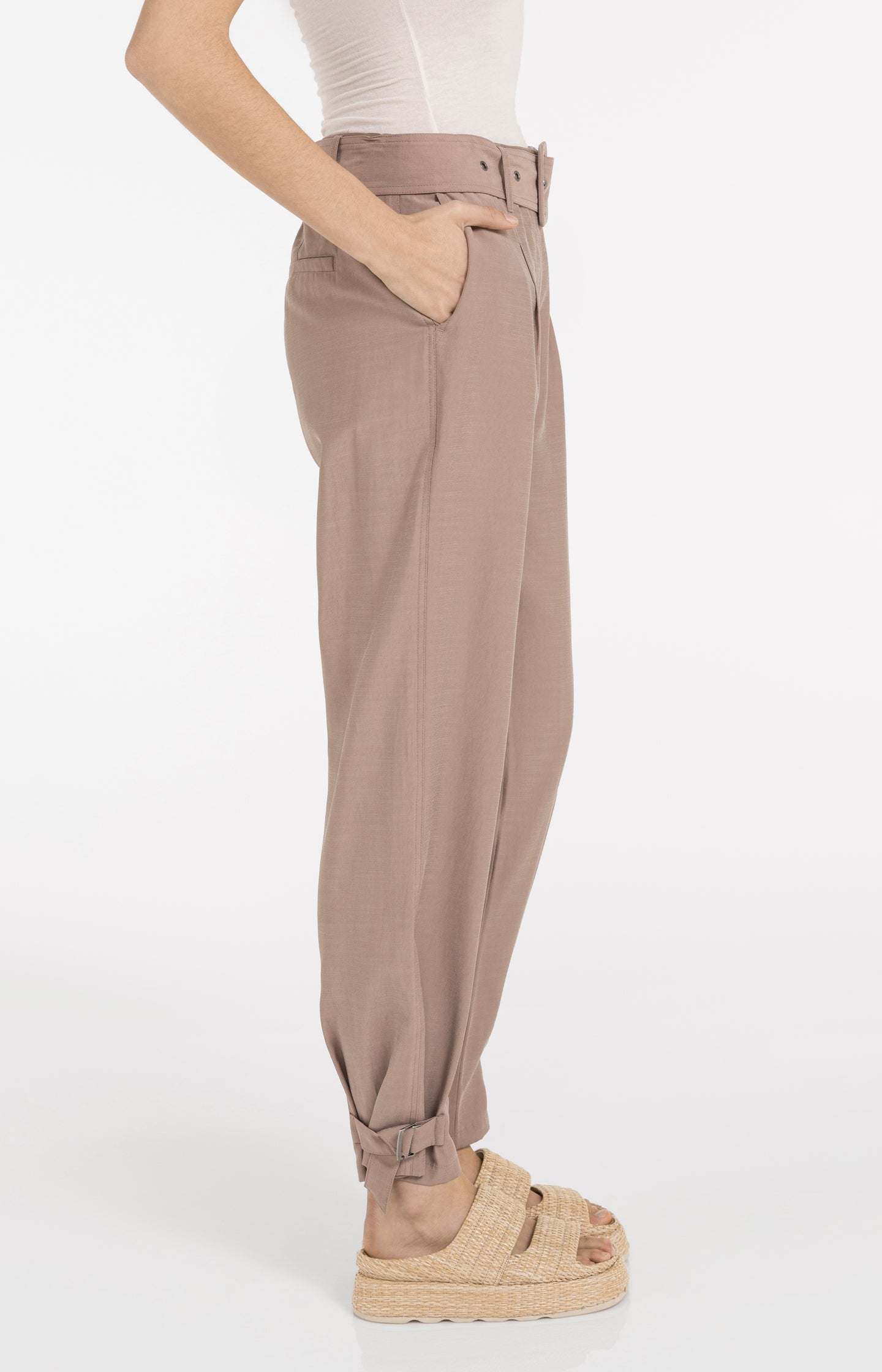 High waist trousers with strap details at the bottom hem
