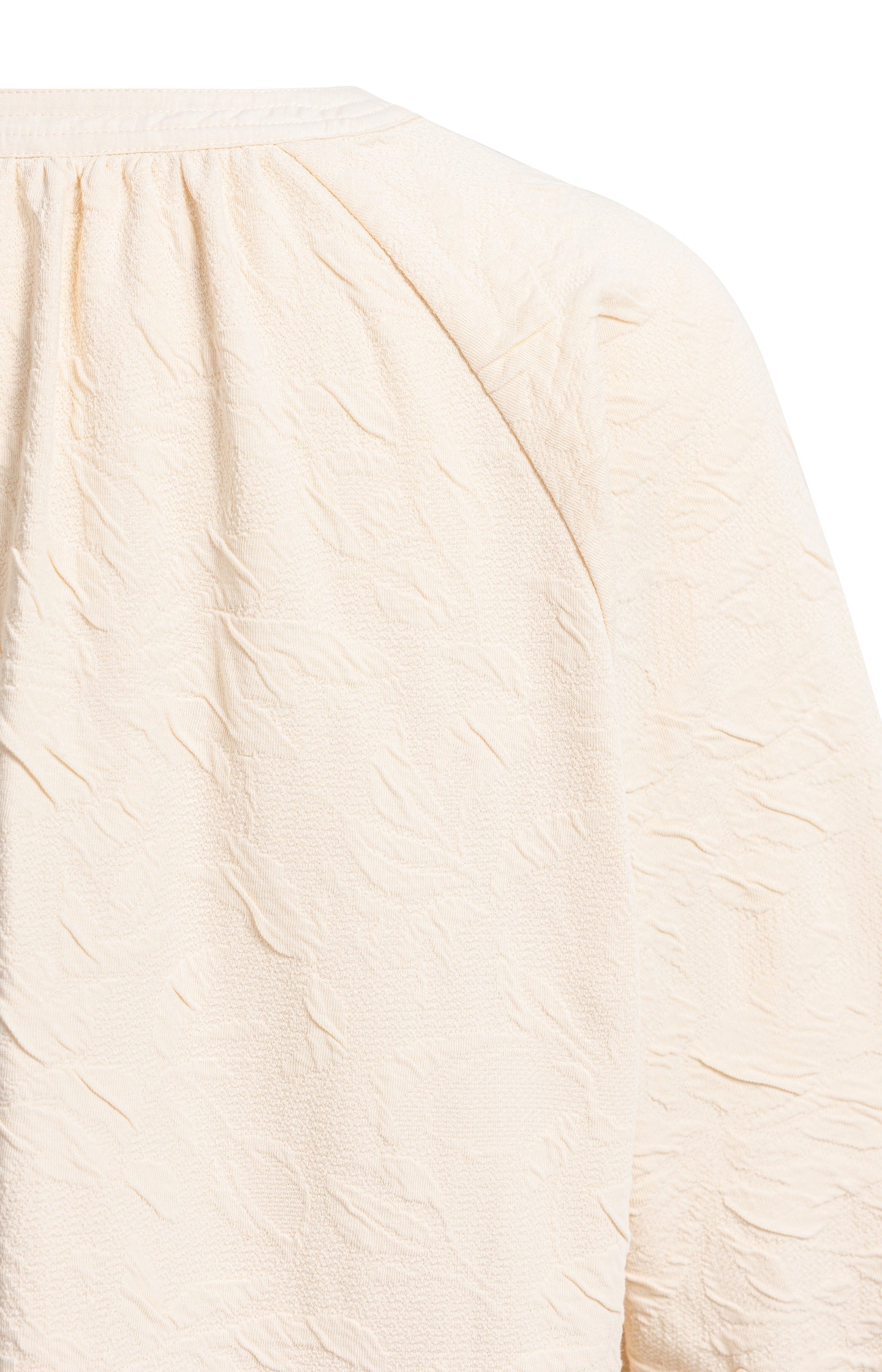 Jersey dress with texture and drawstring details