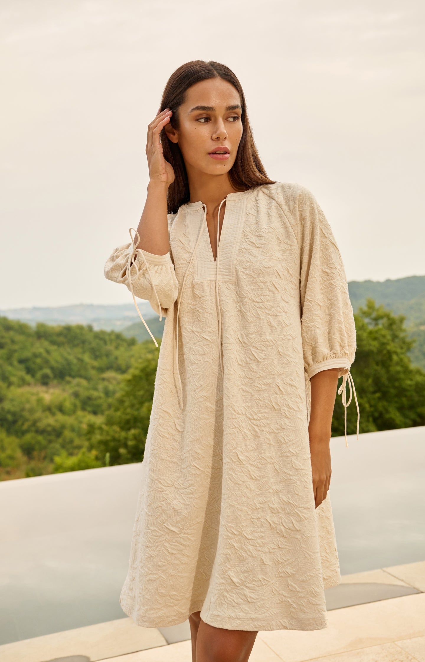 Jersey dress with texture and drawstring details Jersey dress with texture and drawstring details