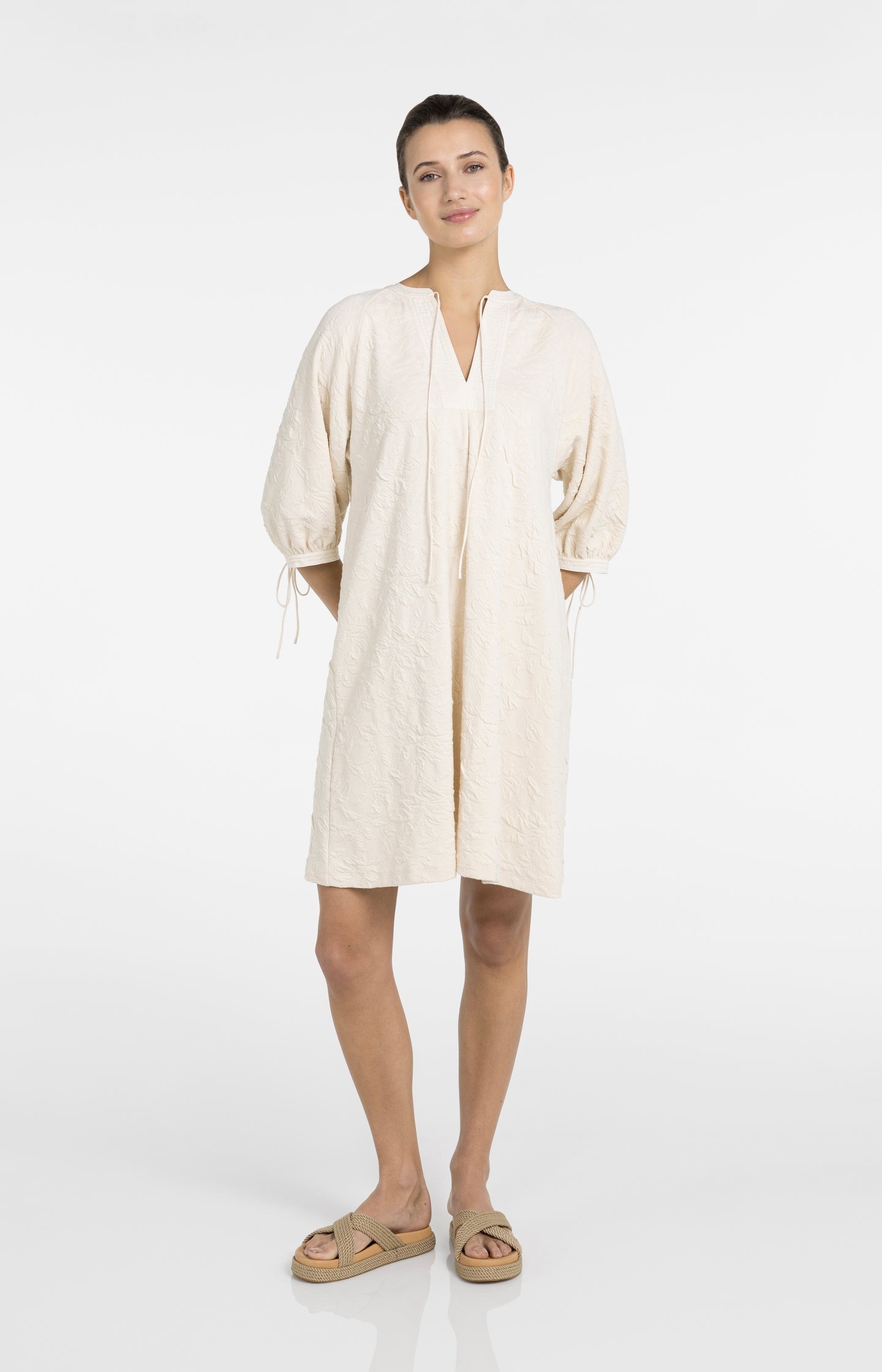 Jersey dress with texture and drawstring details