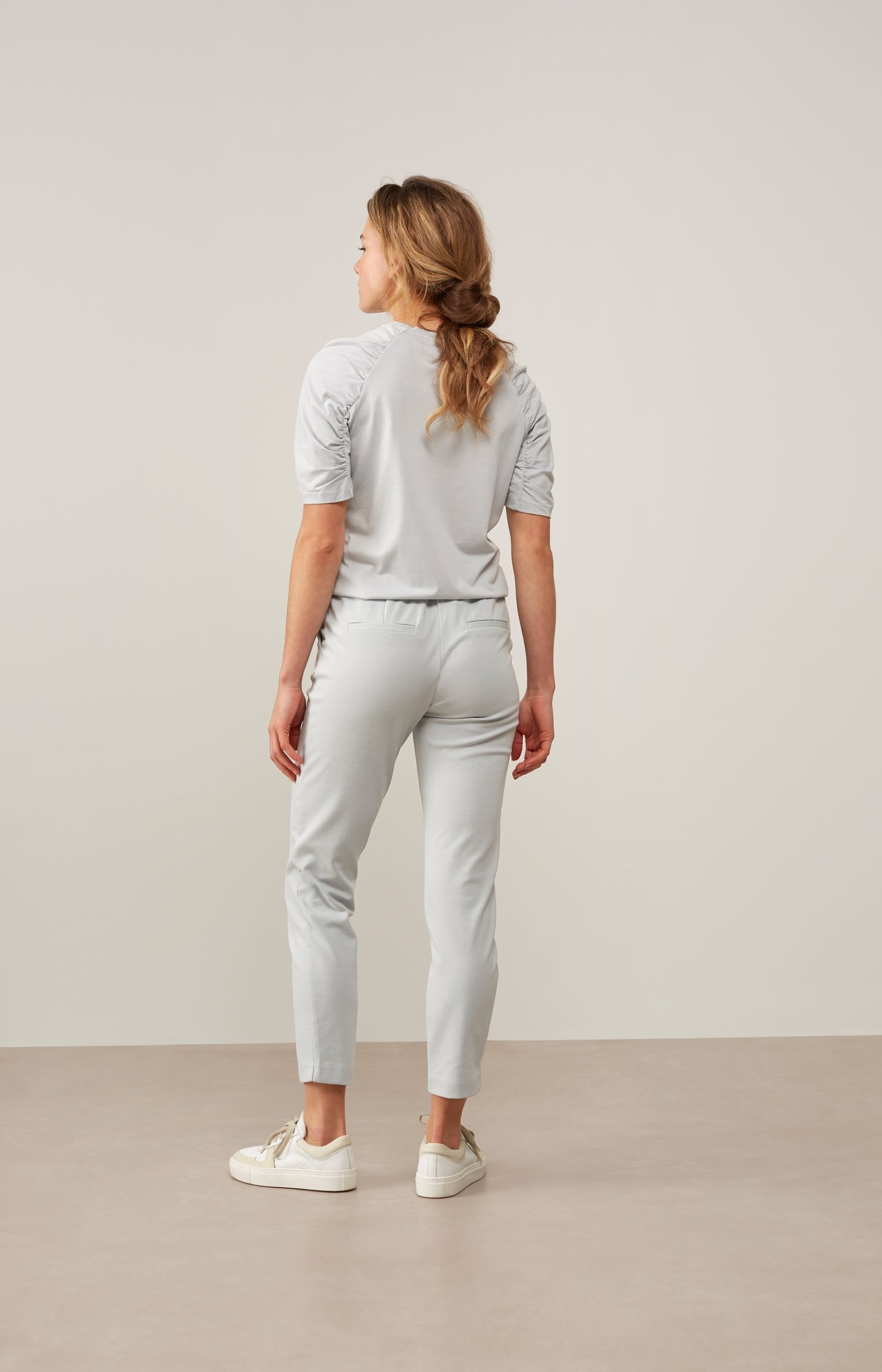 Jersey jogging trousers with side pockets and zip fly