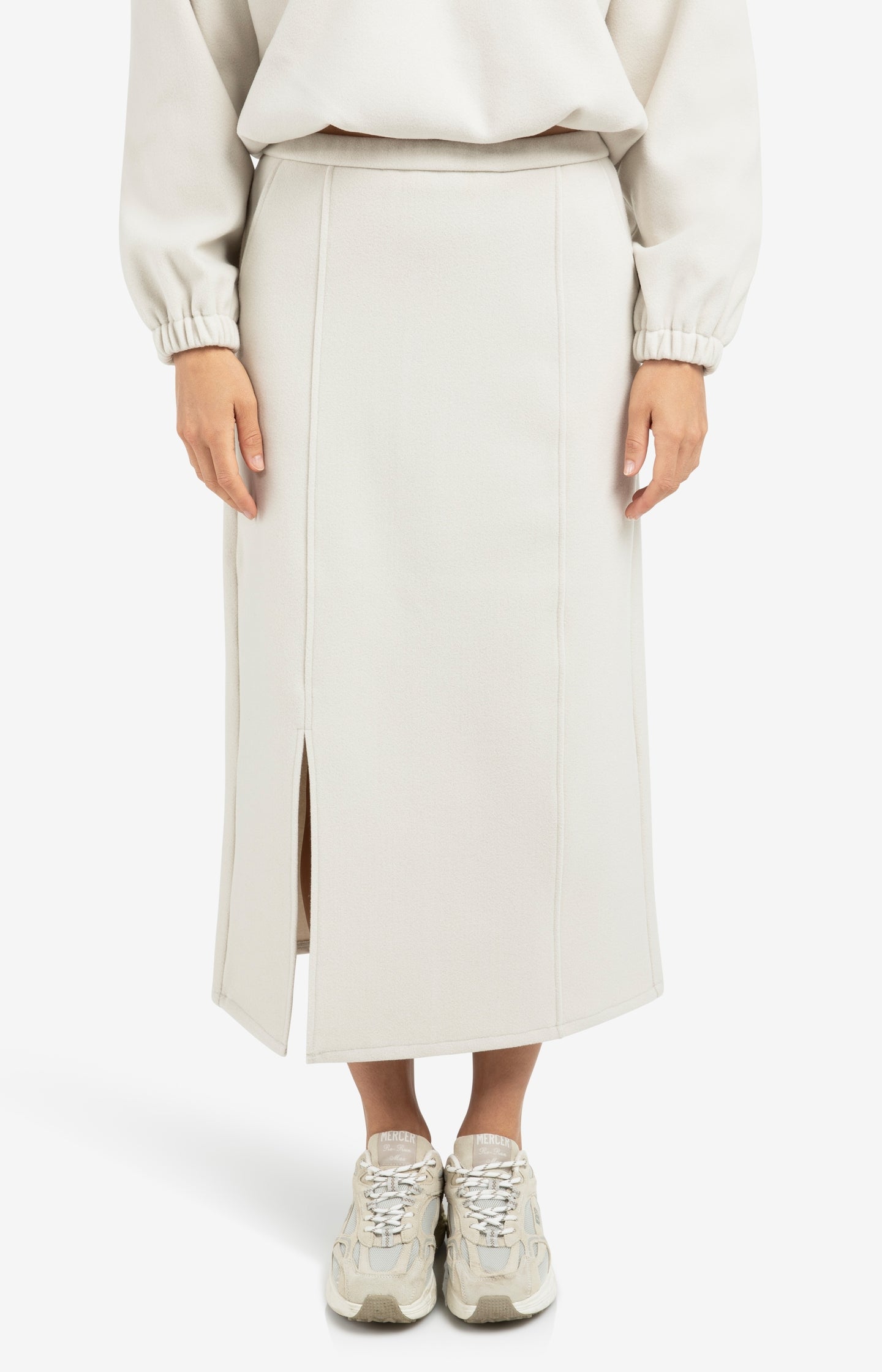 Jersey midi skirt with elastic waistband and front slit