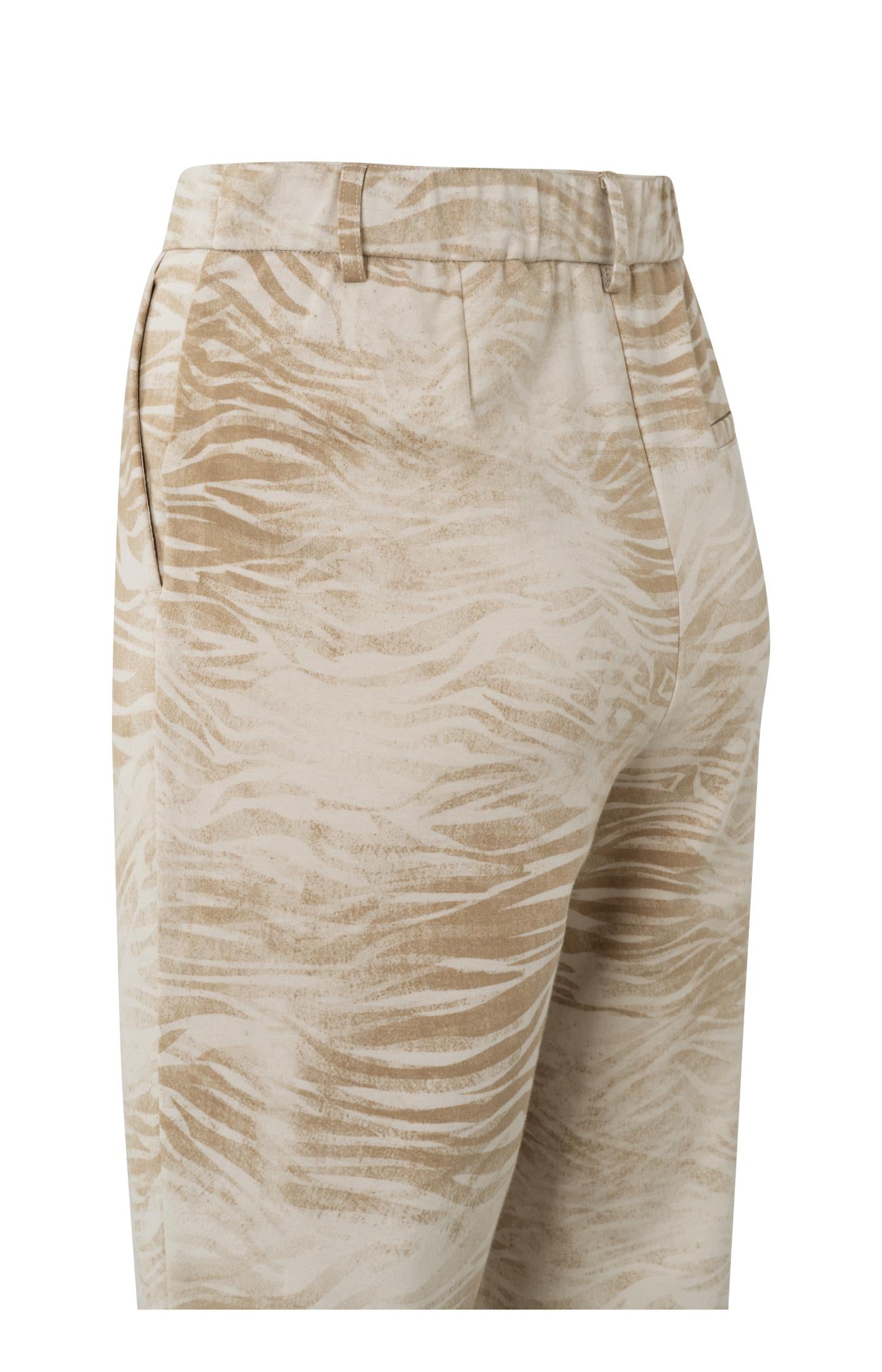 Jersey pantalon with side pockets, a zipfly and animal print