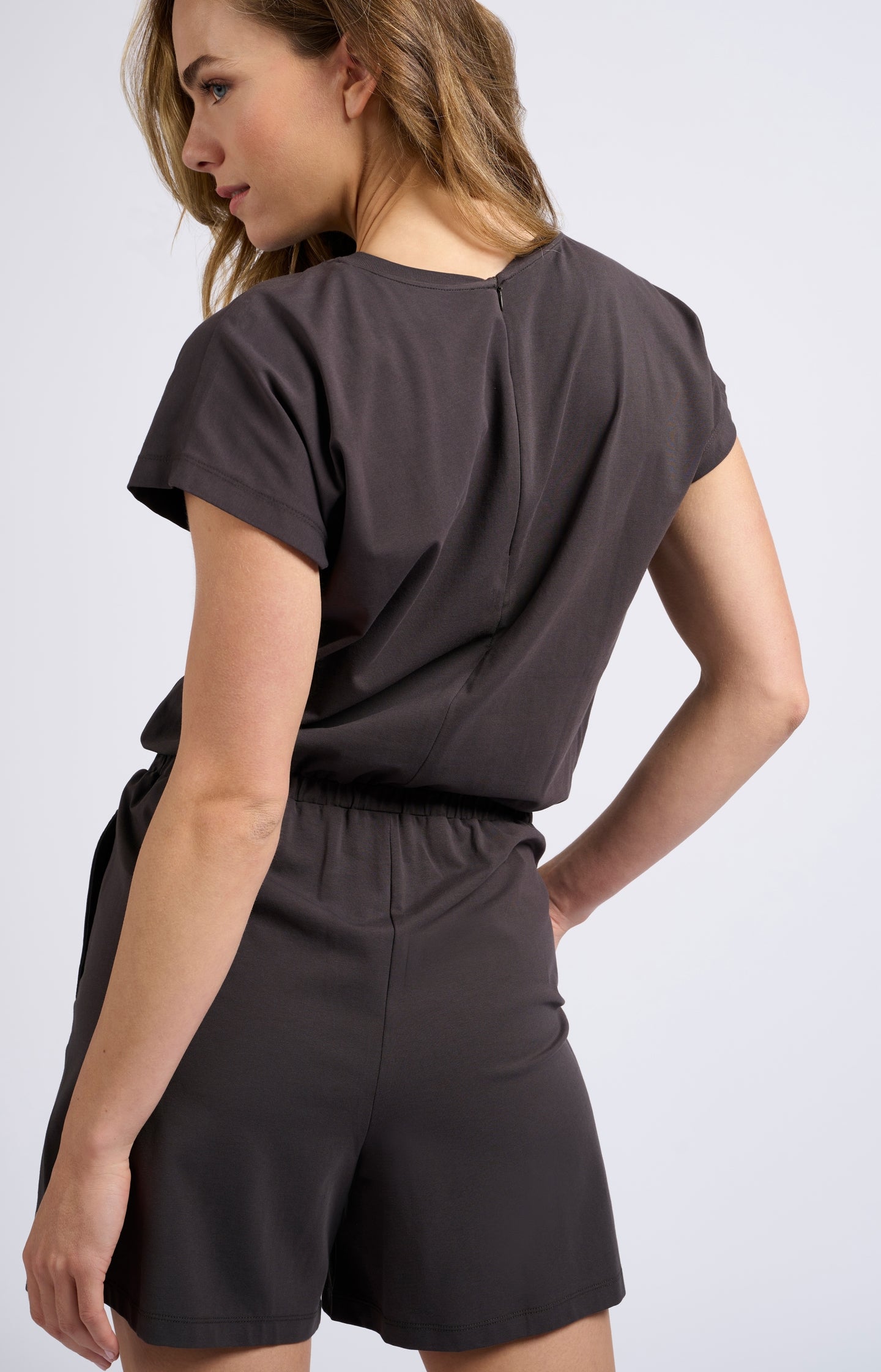 Jersey playsuit with batwing sleeves and pockets