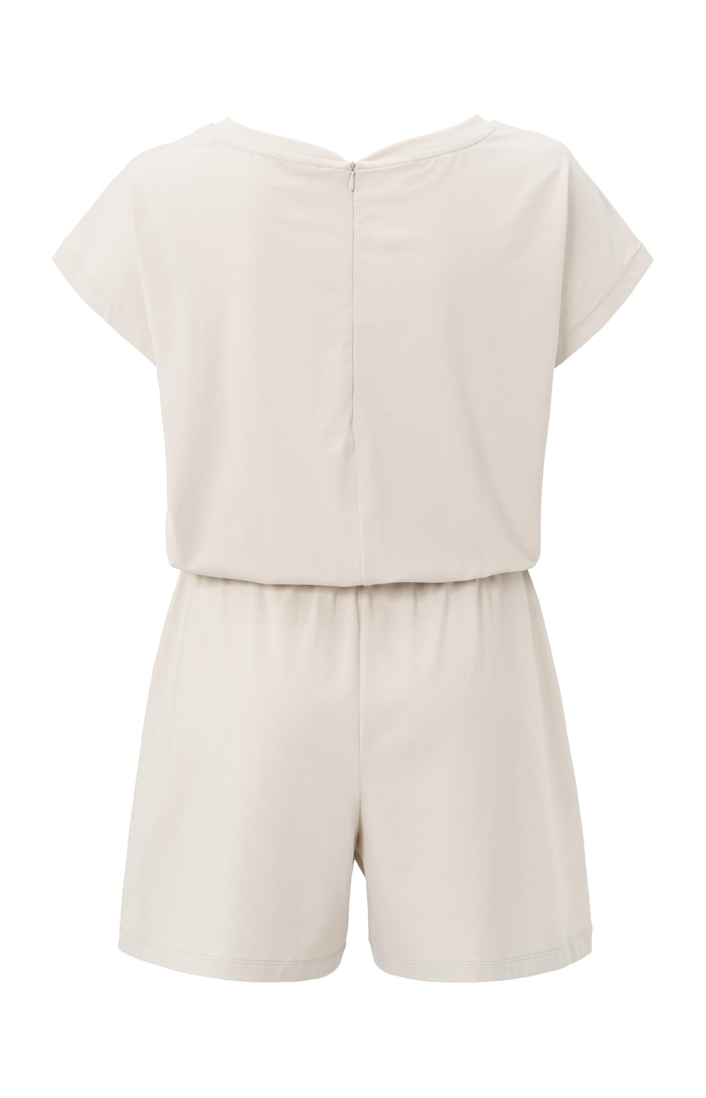 Jersey playsuit with batwing sleeves and pockets