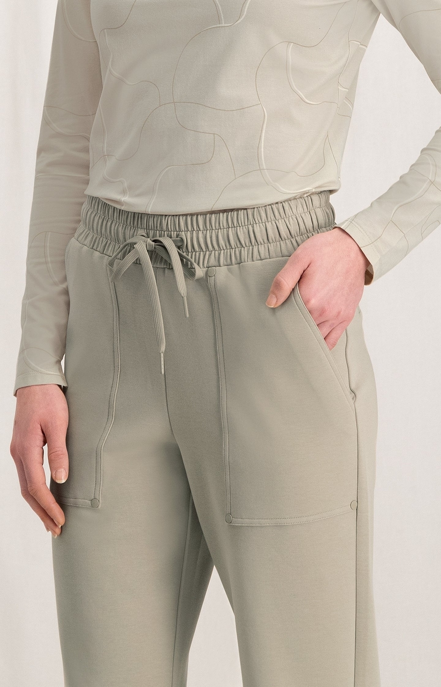 Jersey scuba trousers with flared leg, drawstring and pocket