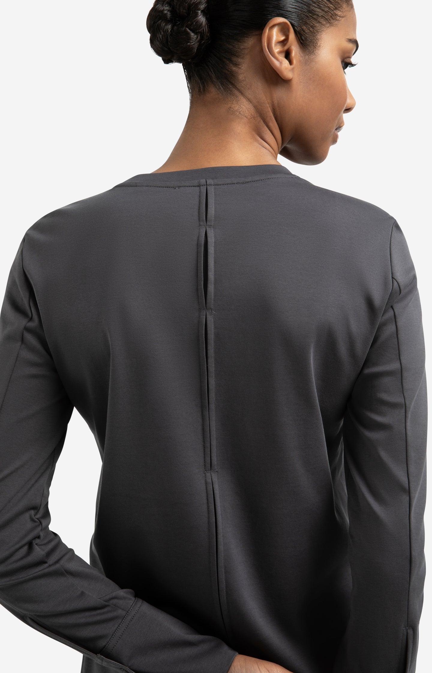 Jersey top with woven cuffs and slit detail