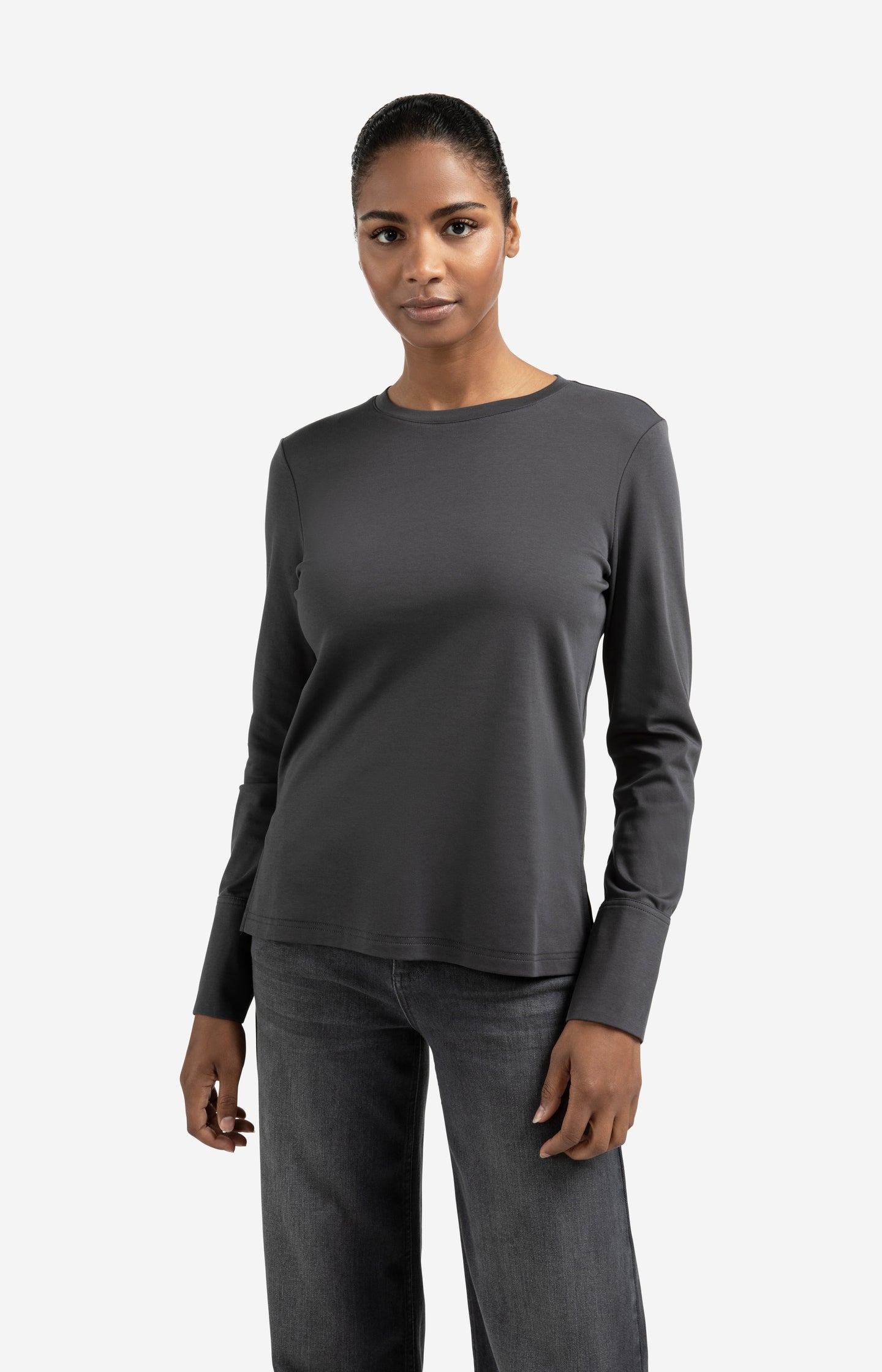Jersey top with woven cuffs and slit detail