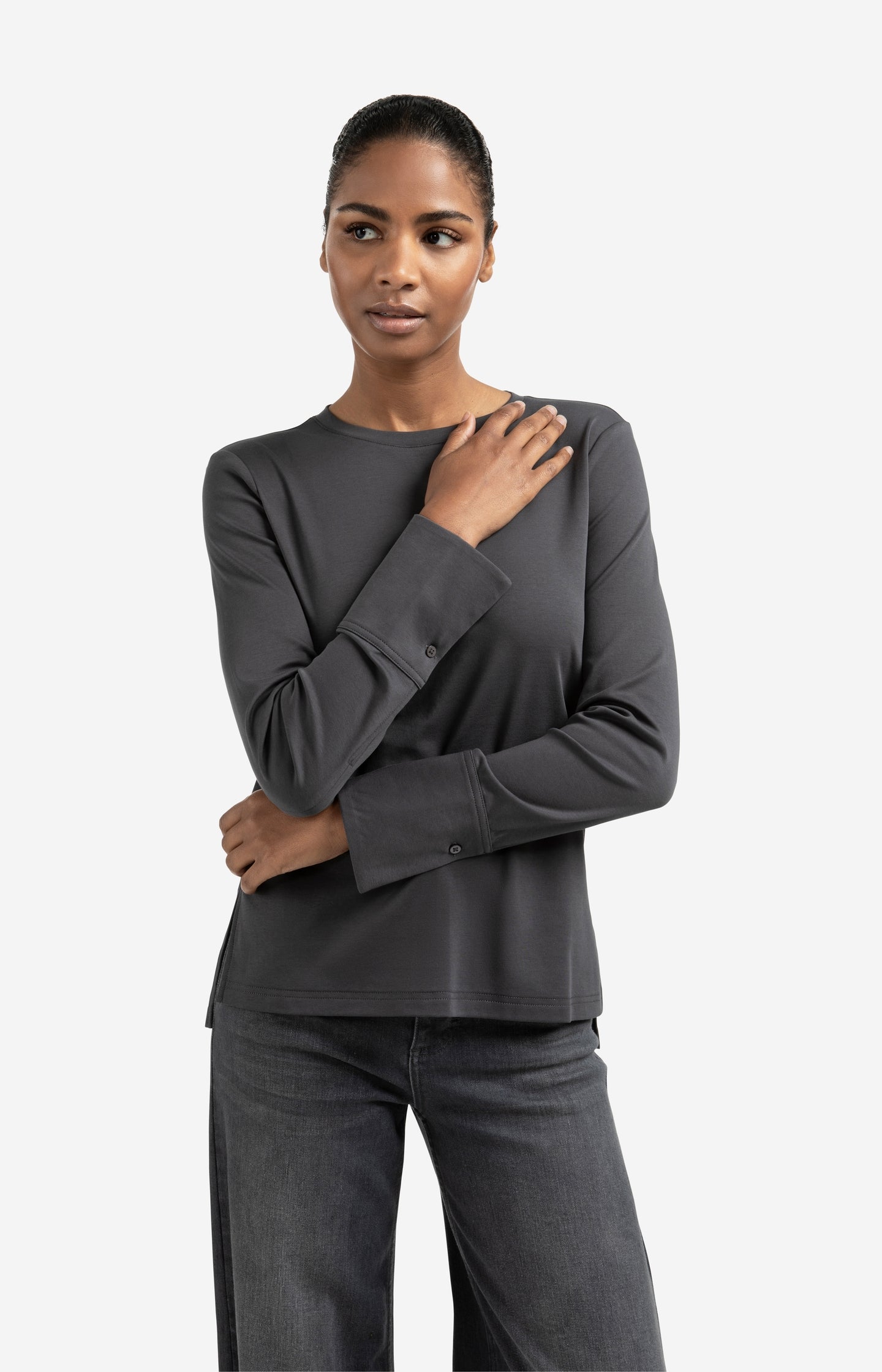 Jersey top with woven cuffs and slit detail