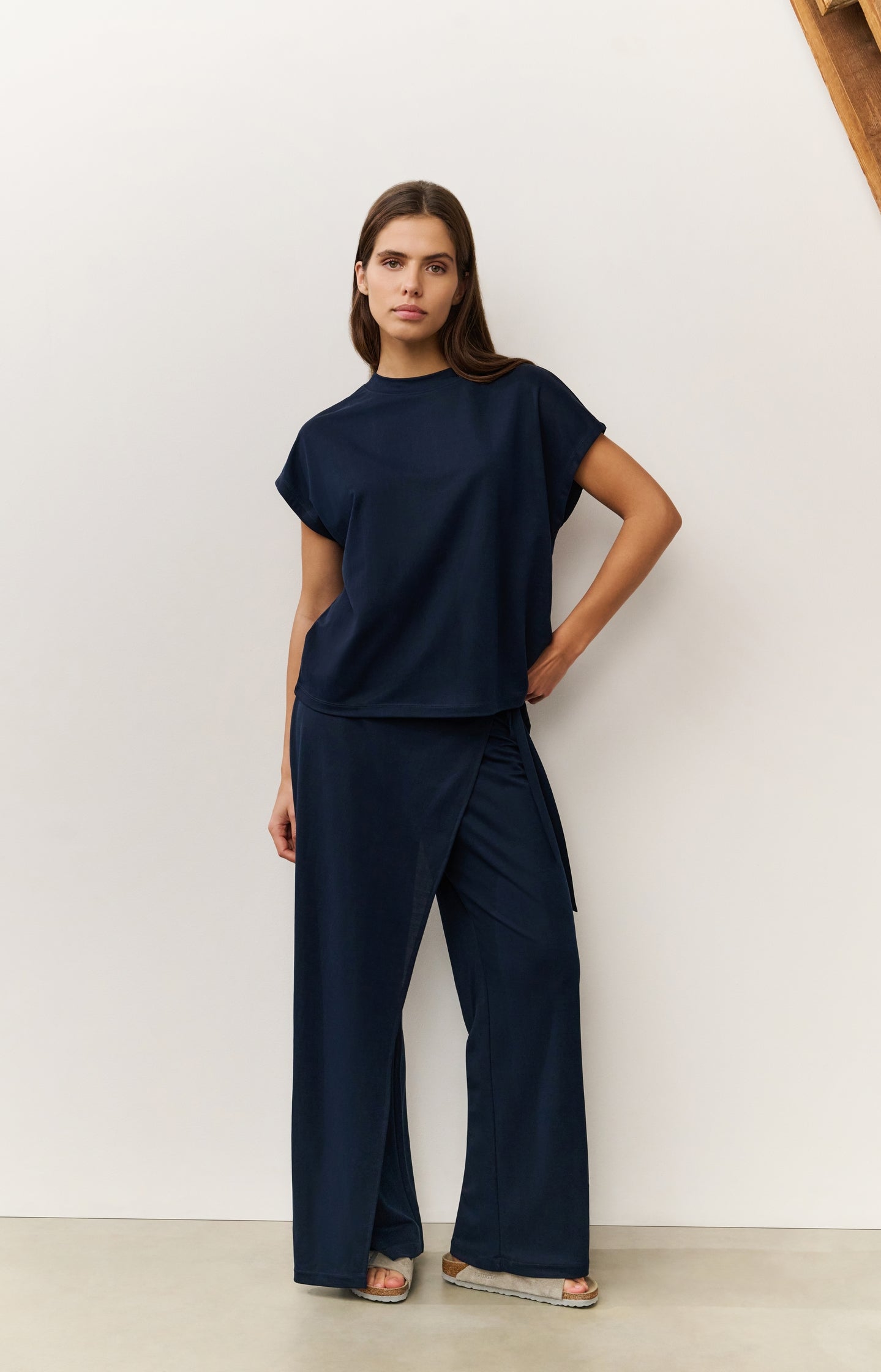 Jersey trousers with a wrap skirt effect and wide legs