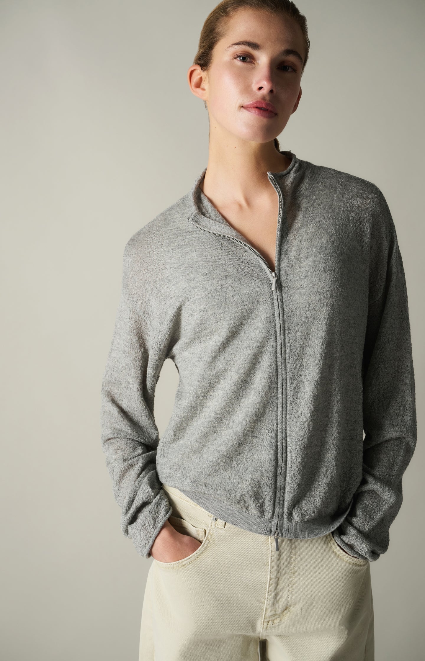 Knitted cardigan with high neck and zipper