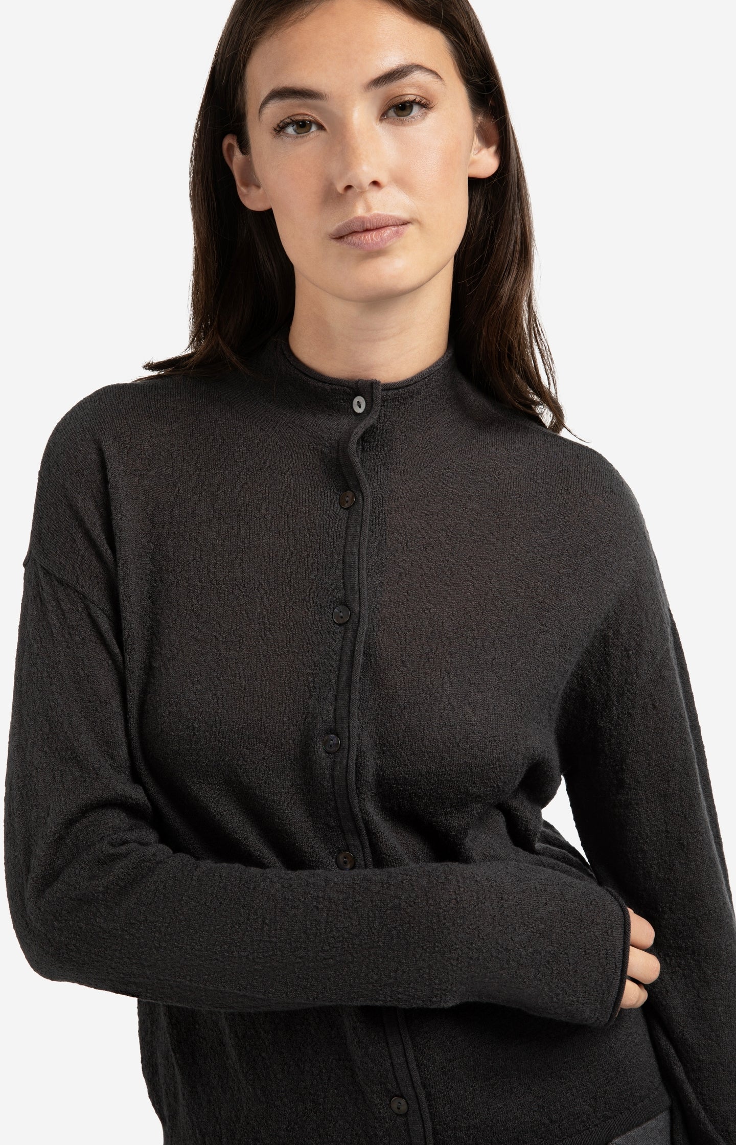 Knitted cardigan with high neckline and button closure