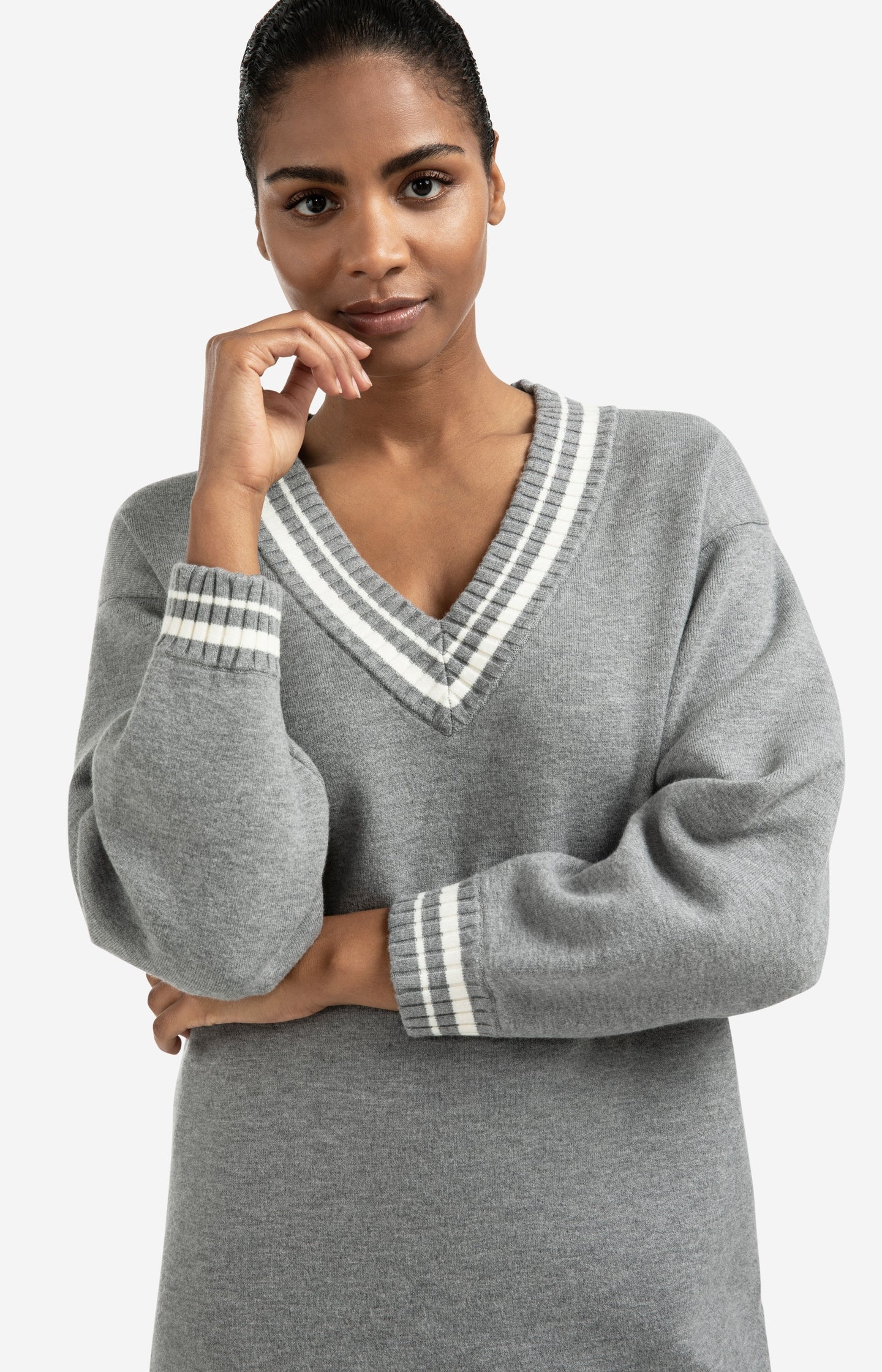 Knitted dress with V-neck and ribbed details