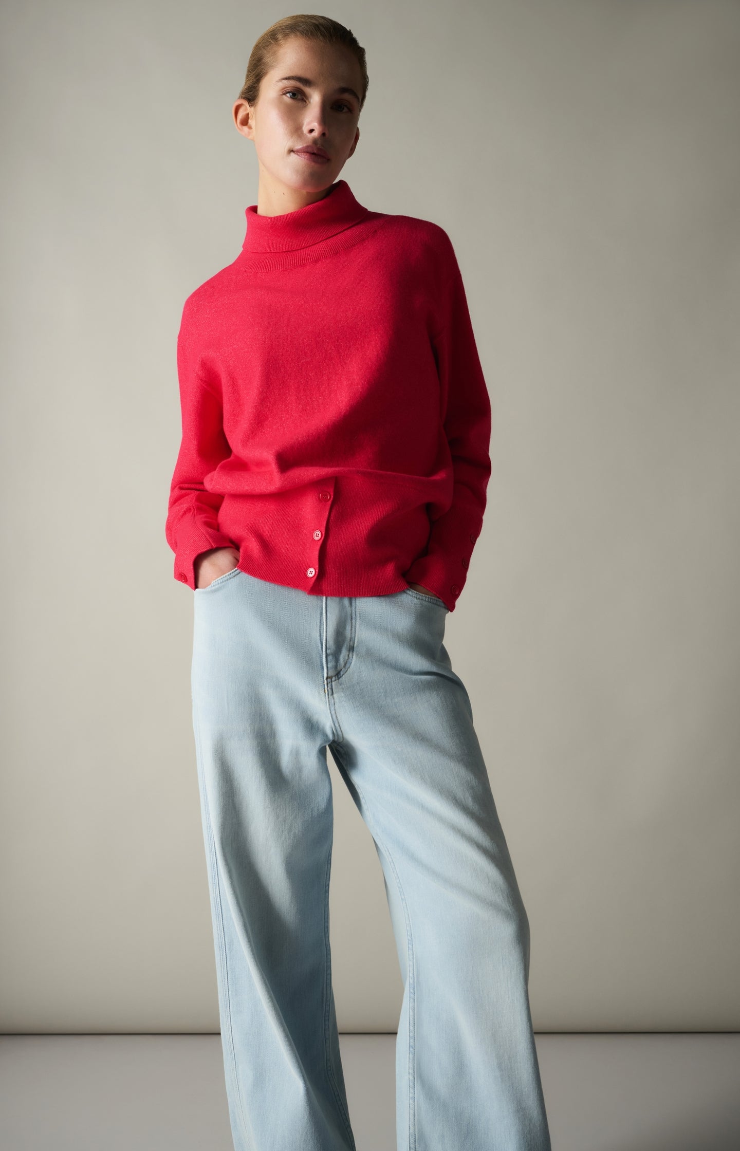 Knitted high neck sweater with button details