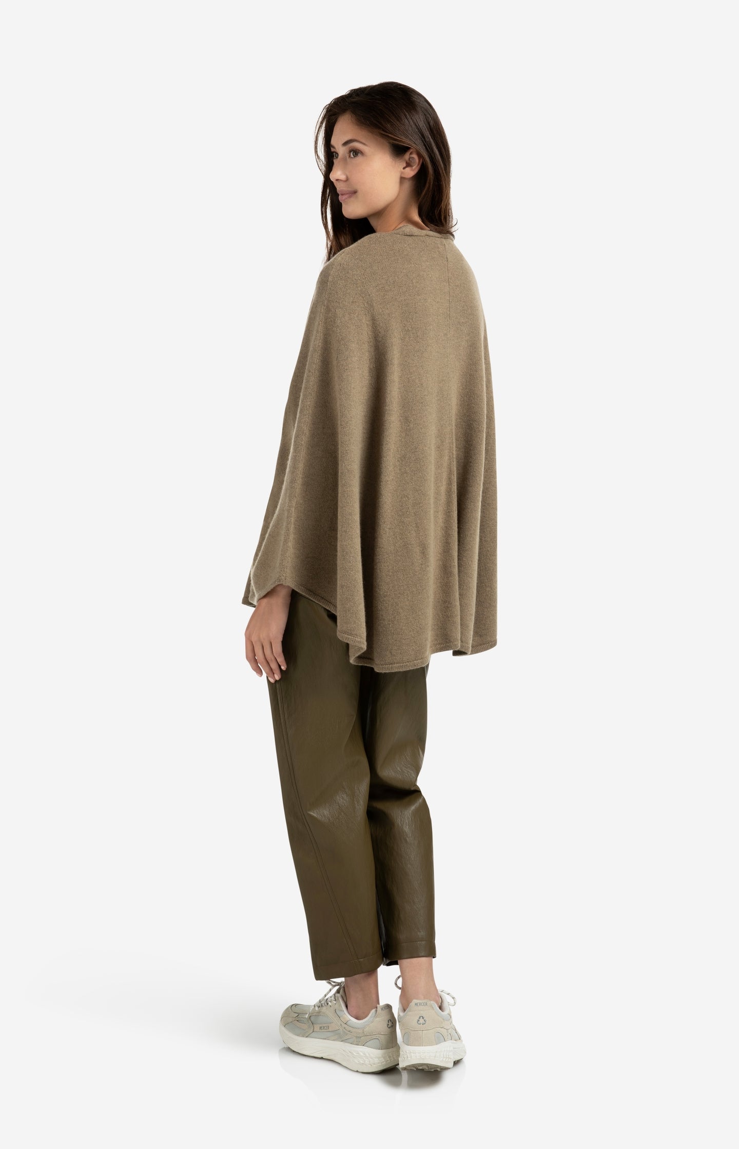 Knitted poncho with tie belt