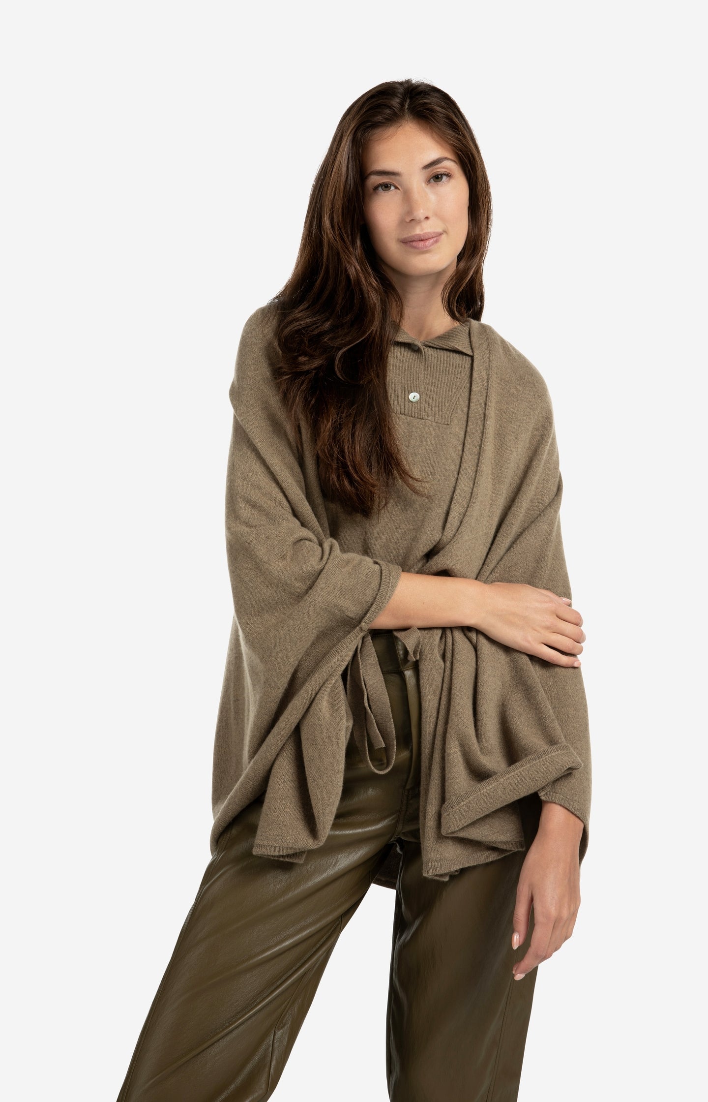 Knitted poncho with tie belt