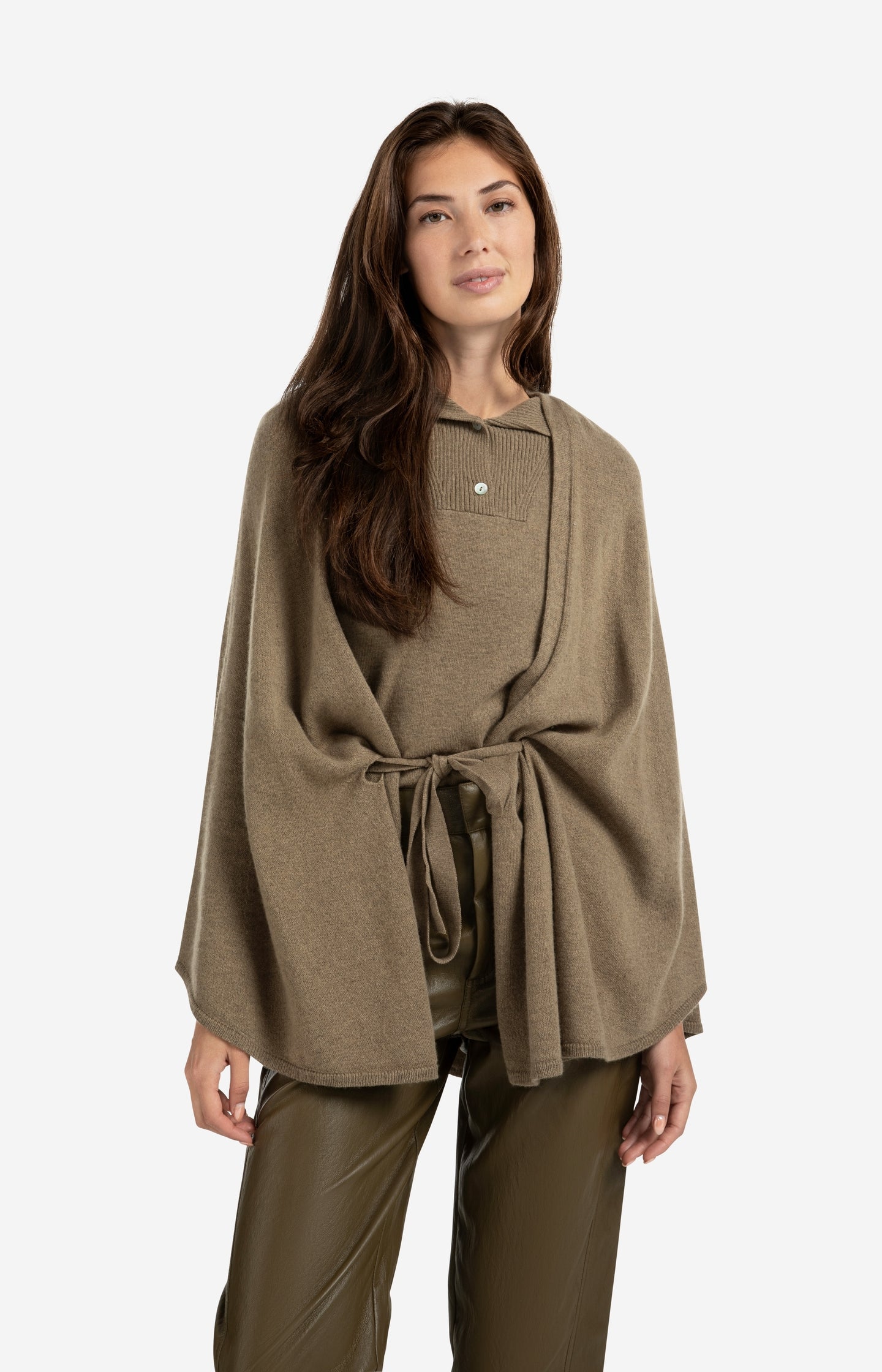 Knitted poncho with tie belt
