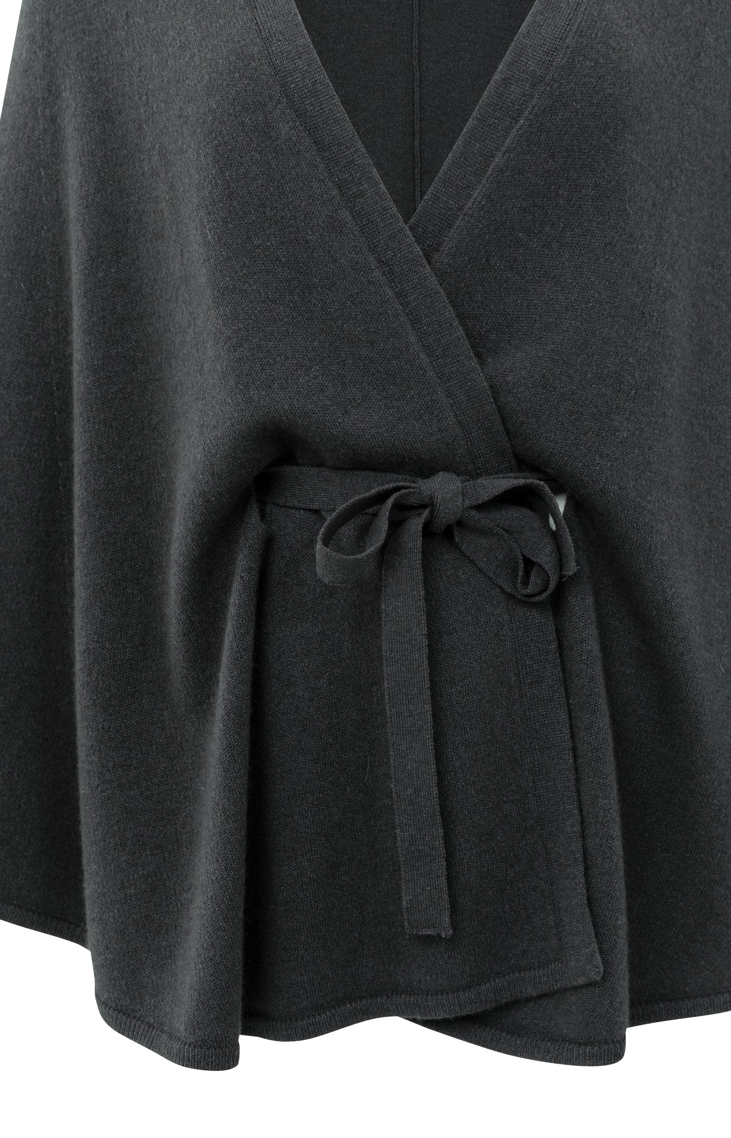 Knitted poncho with tie belt
