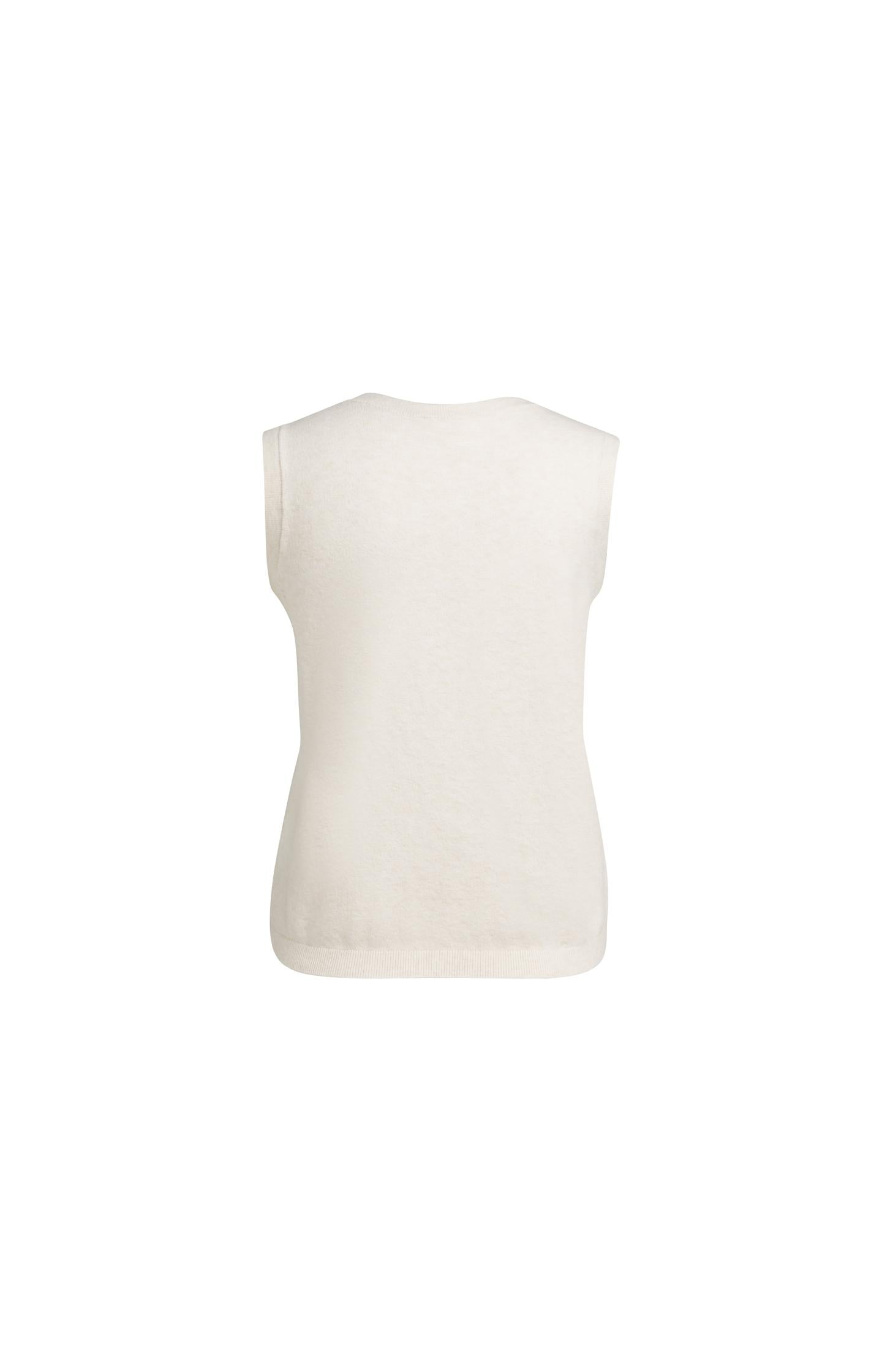 Knitted spencer with button closure