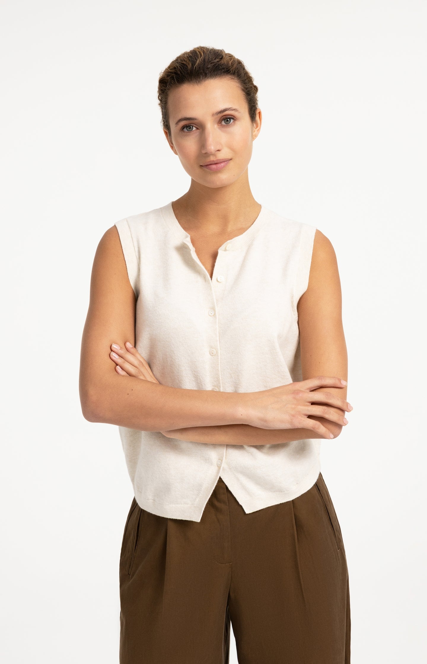 Knitted spencer with button closure