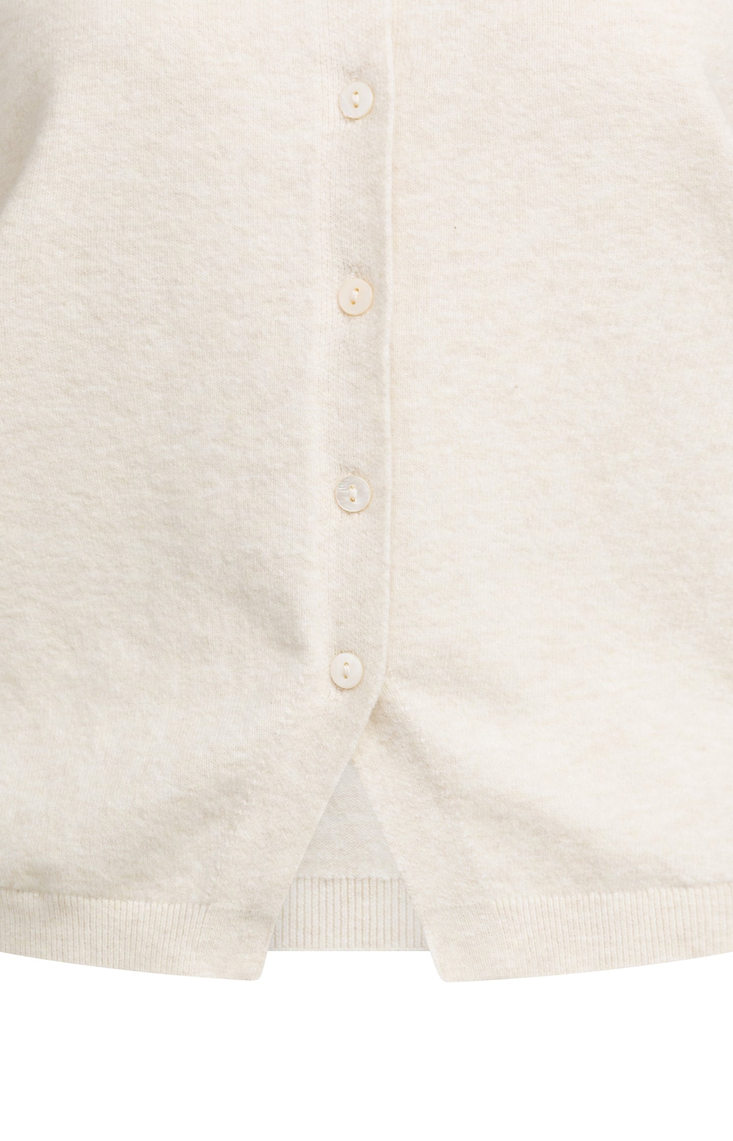 Knitted spencer with button closure