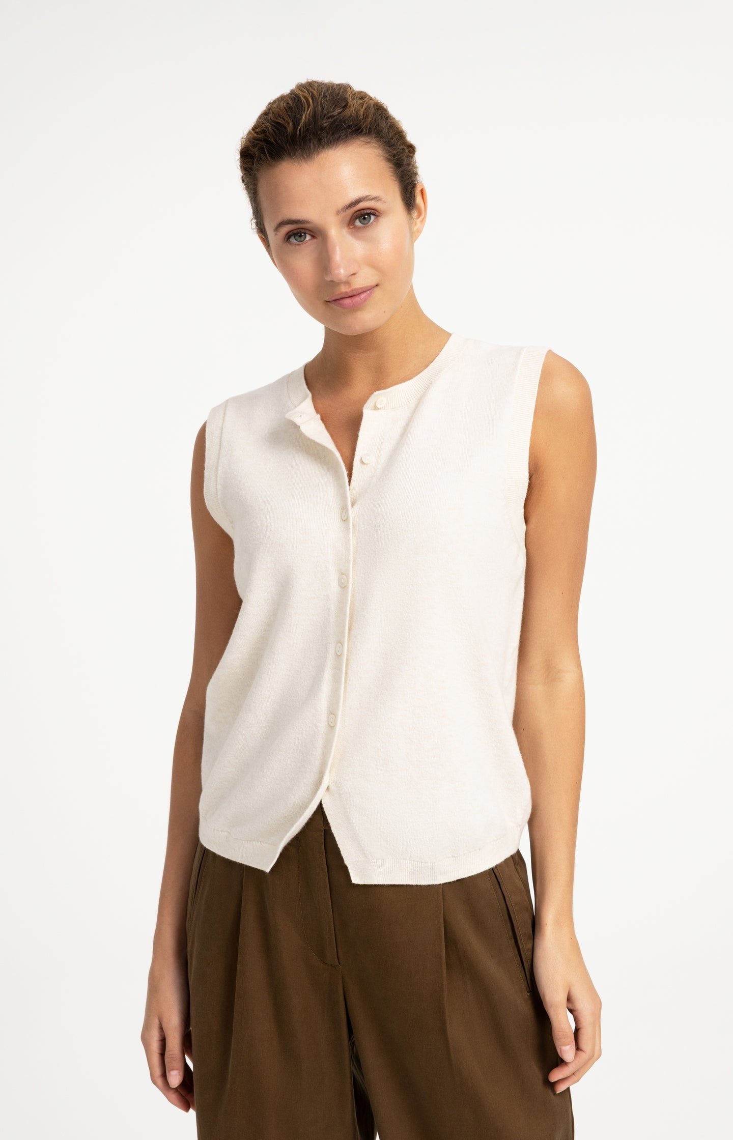 Knitted spencer with button closure