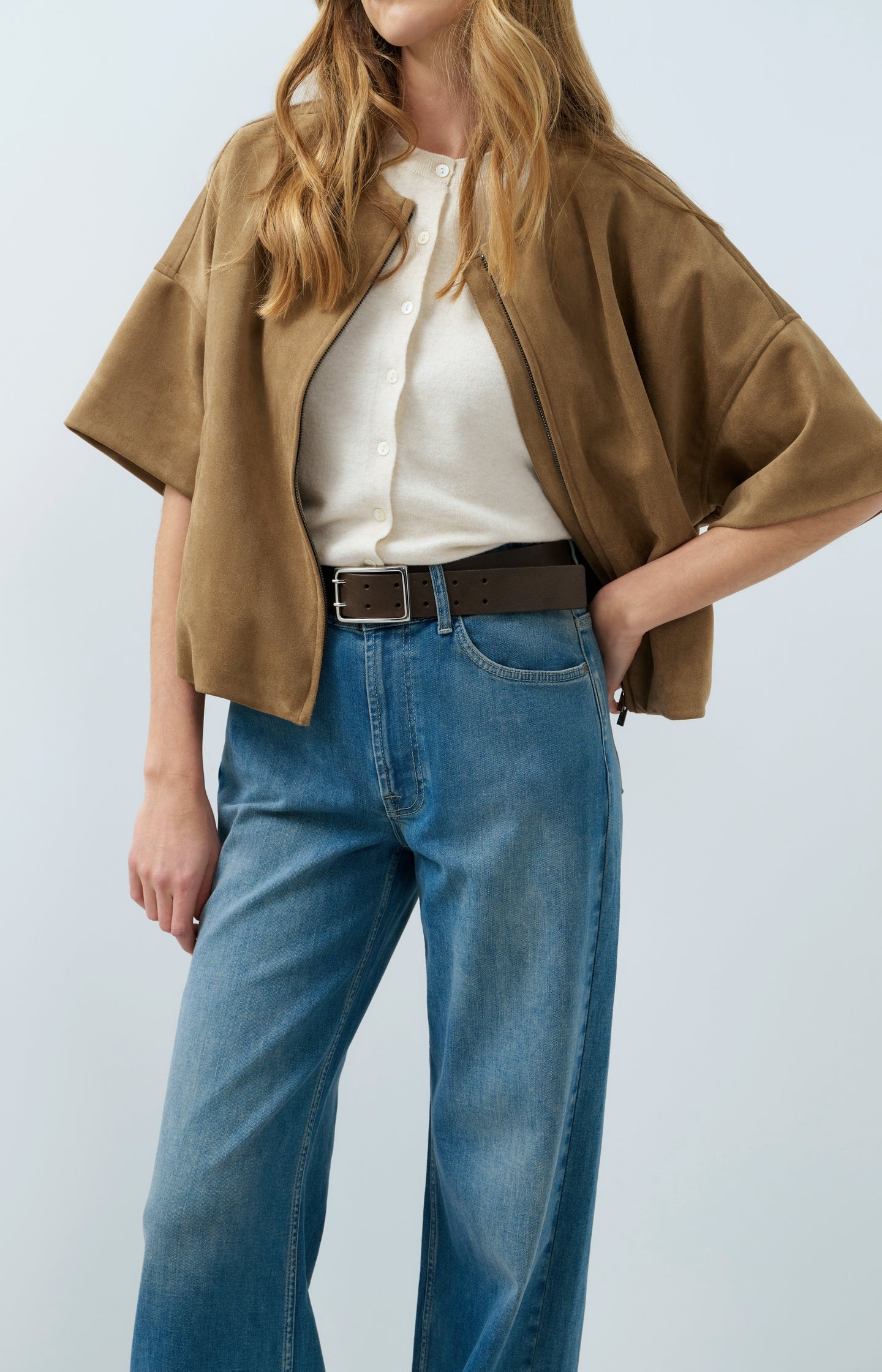 Knitted spencer with button closure
