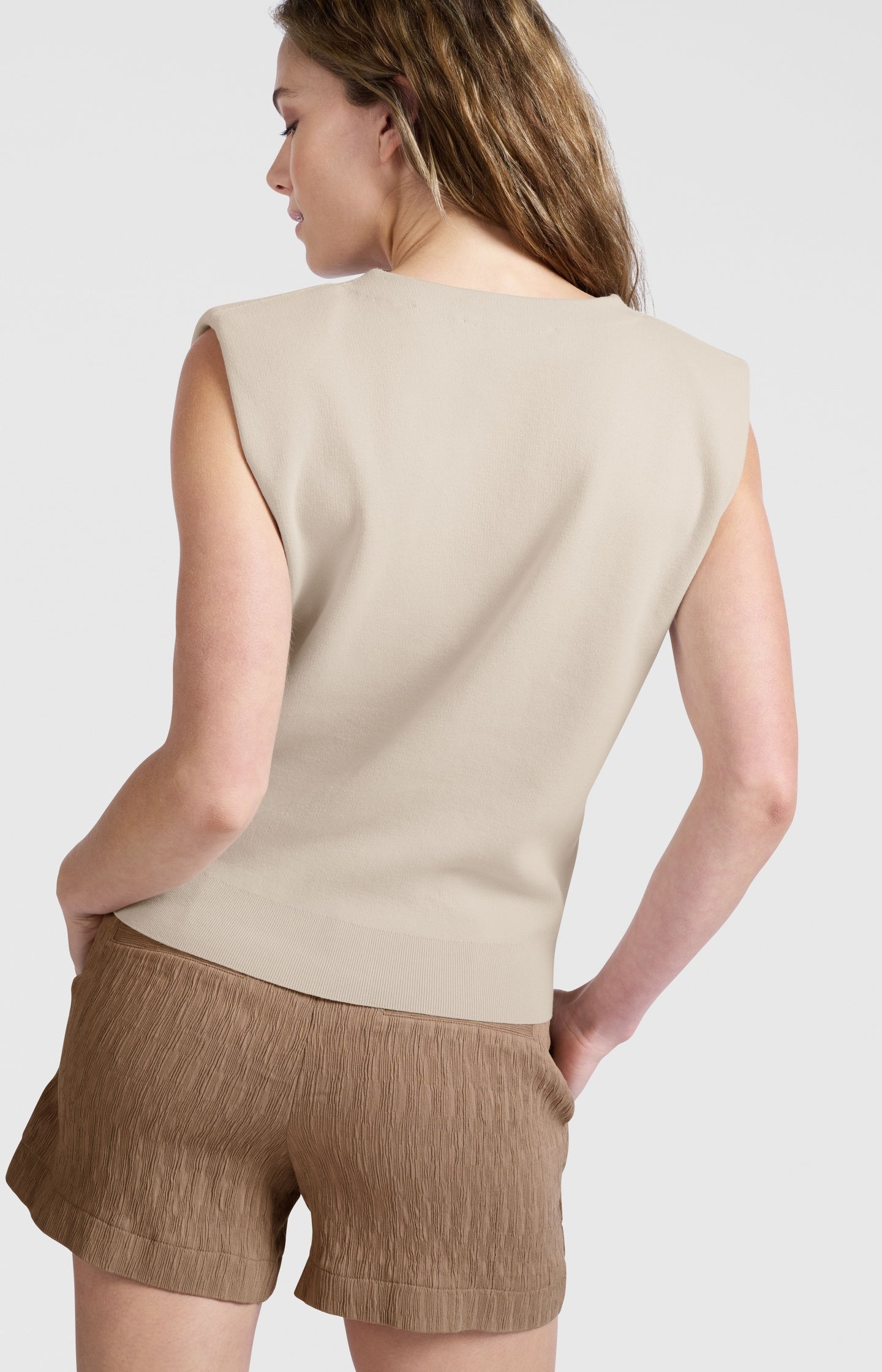 Knitted spencer with shoulder details and V-neck