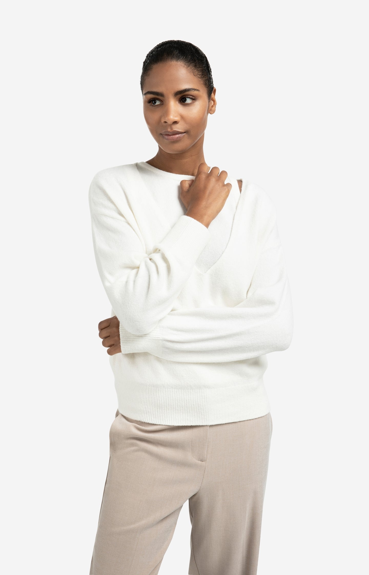 Knitted sweater with deep V-neck and layered top
