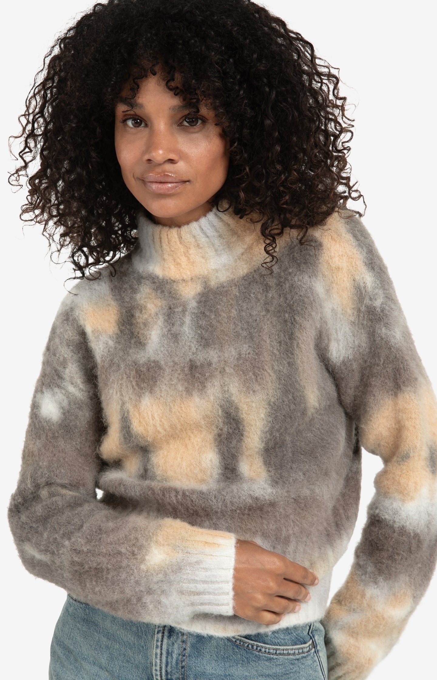 Knitted sweater with melange print and high neck