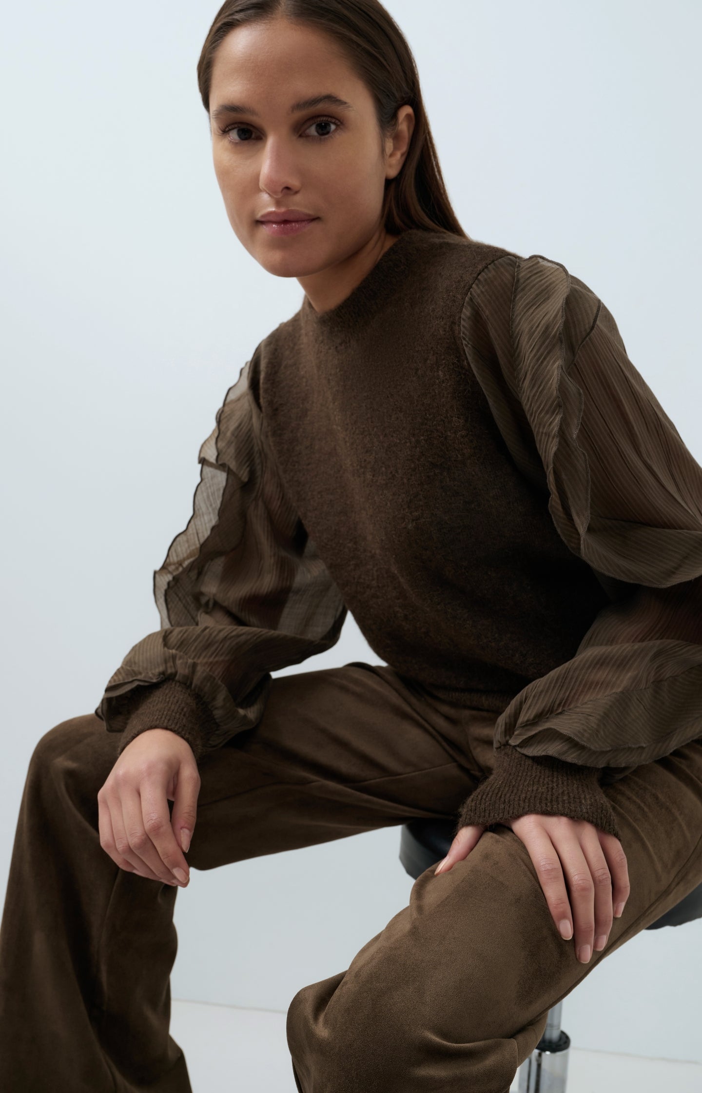 Knitted sweater with ruffle sleeves