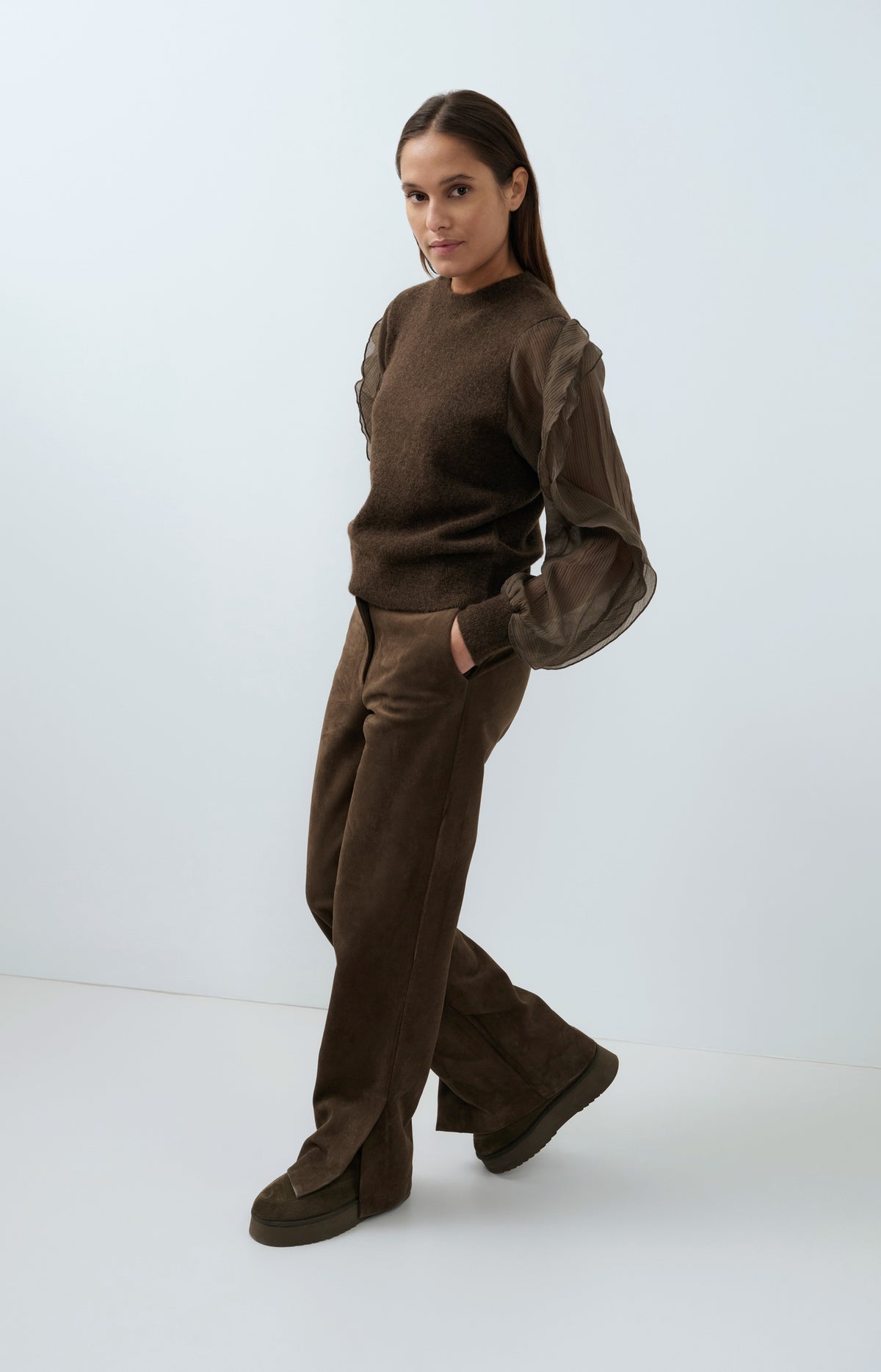 Knitted sweater with ruffle sleeves