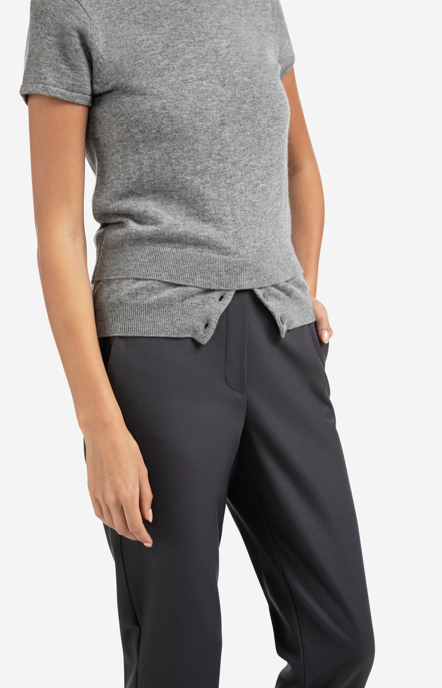 Knitted top with double hem and button details