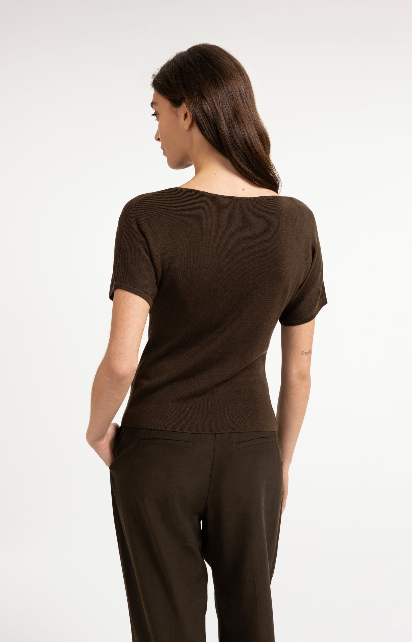 Knitted top with short sleeves and draped neckline