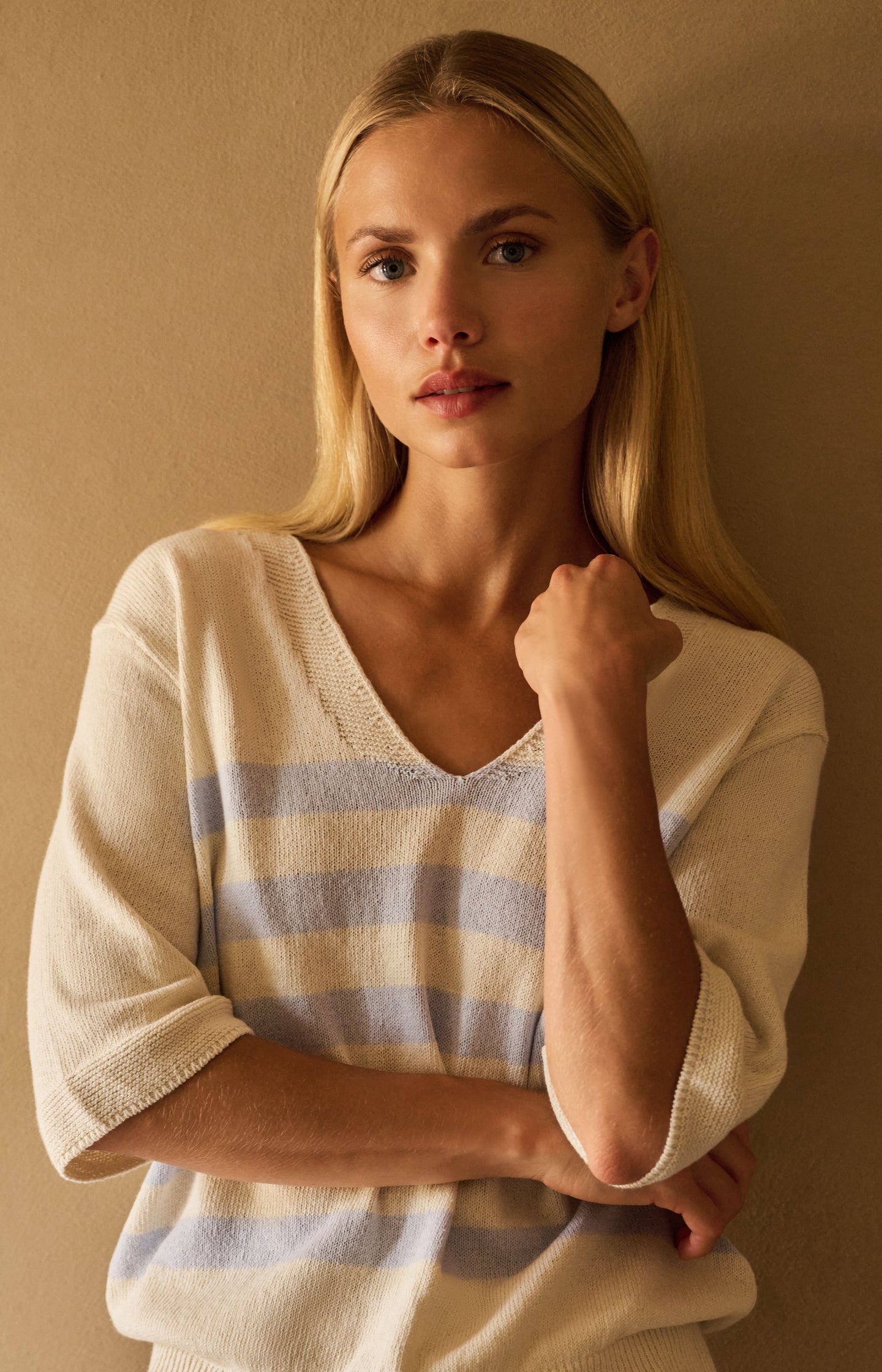 Knitted V-neck sweater with light blue stripes - Type: lookbook