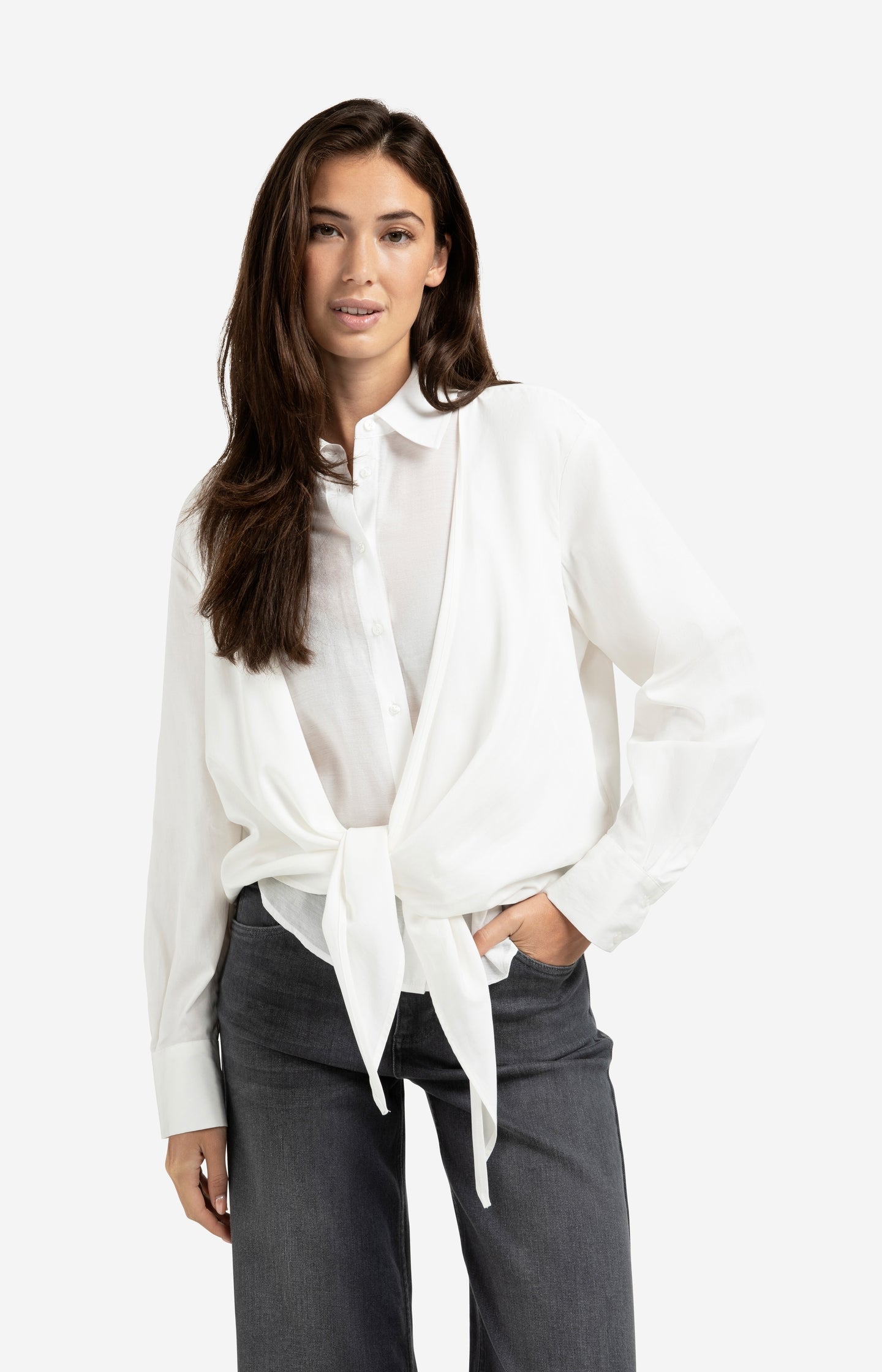 Layered blouse with tie detail and long sleeves