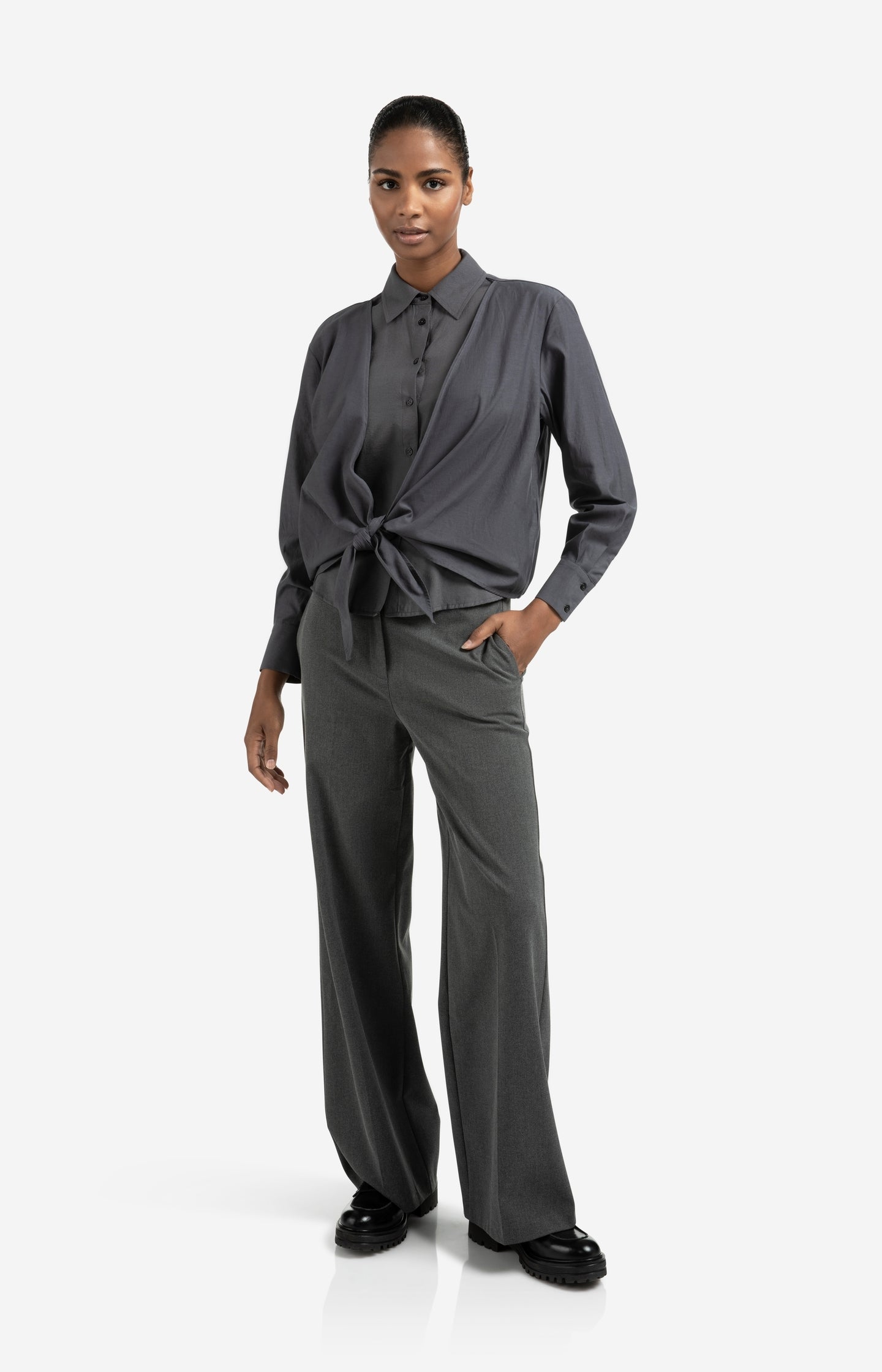 Layered blouse with tie detail and long sleeves