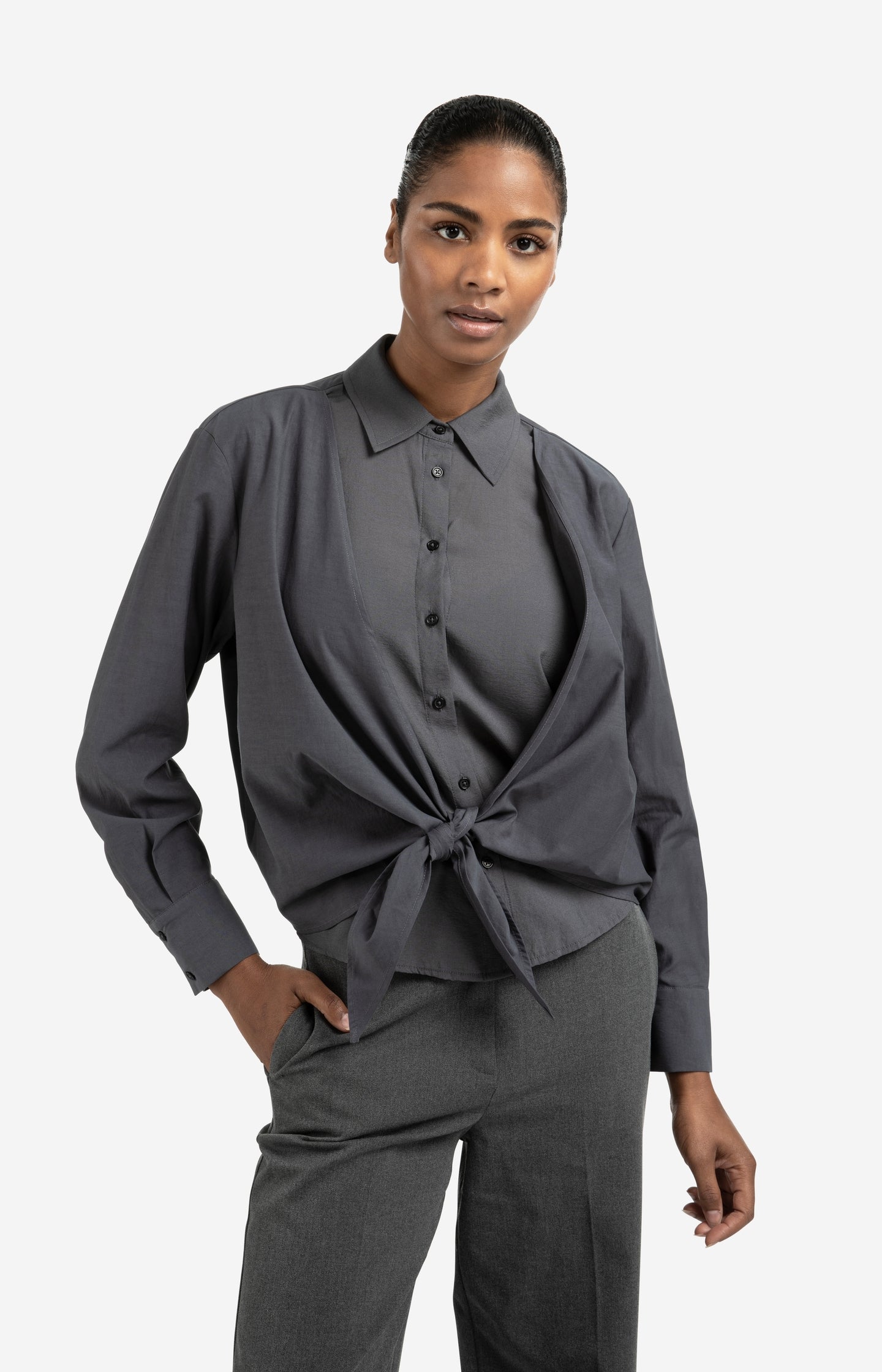 Layered blouse with tie detail and long sleeves