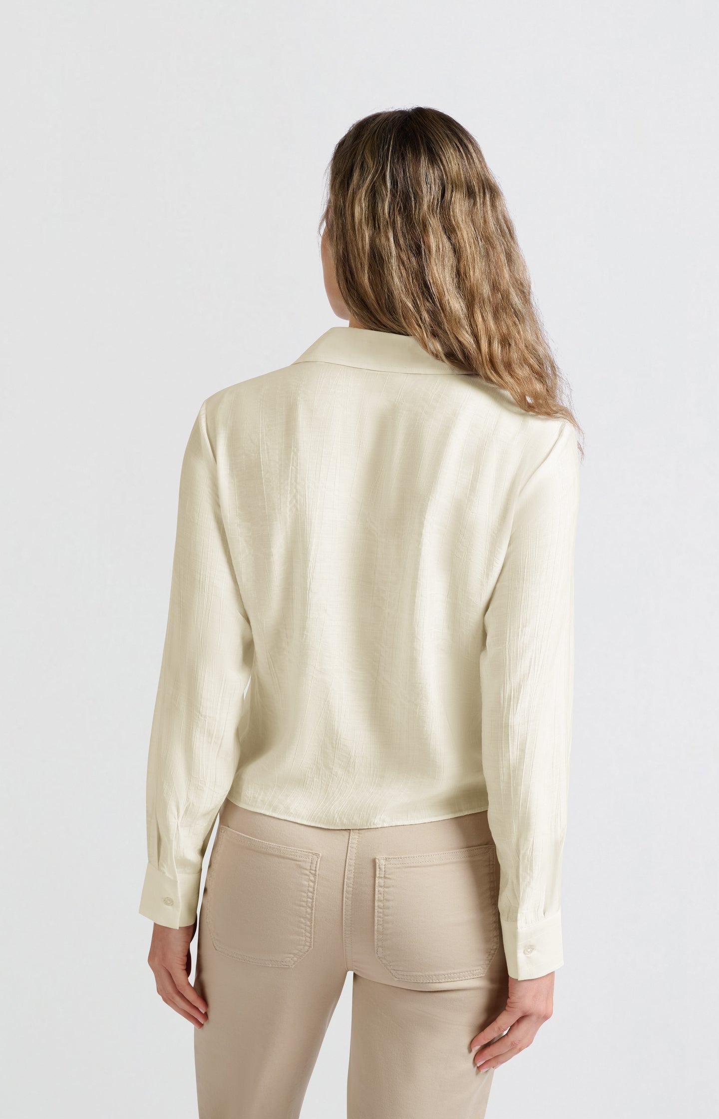 Layered texture blouse with tie detail