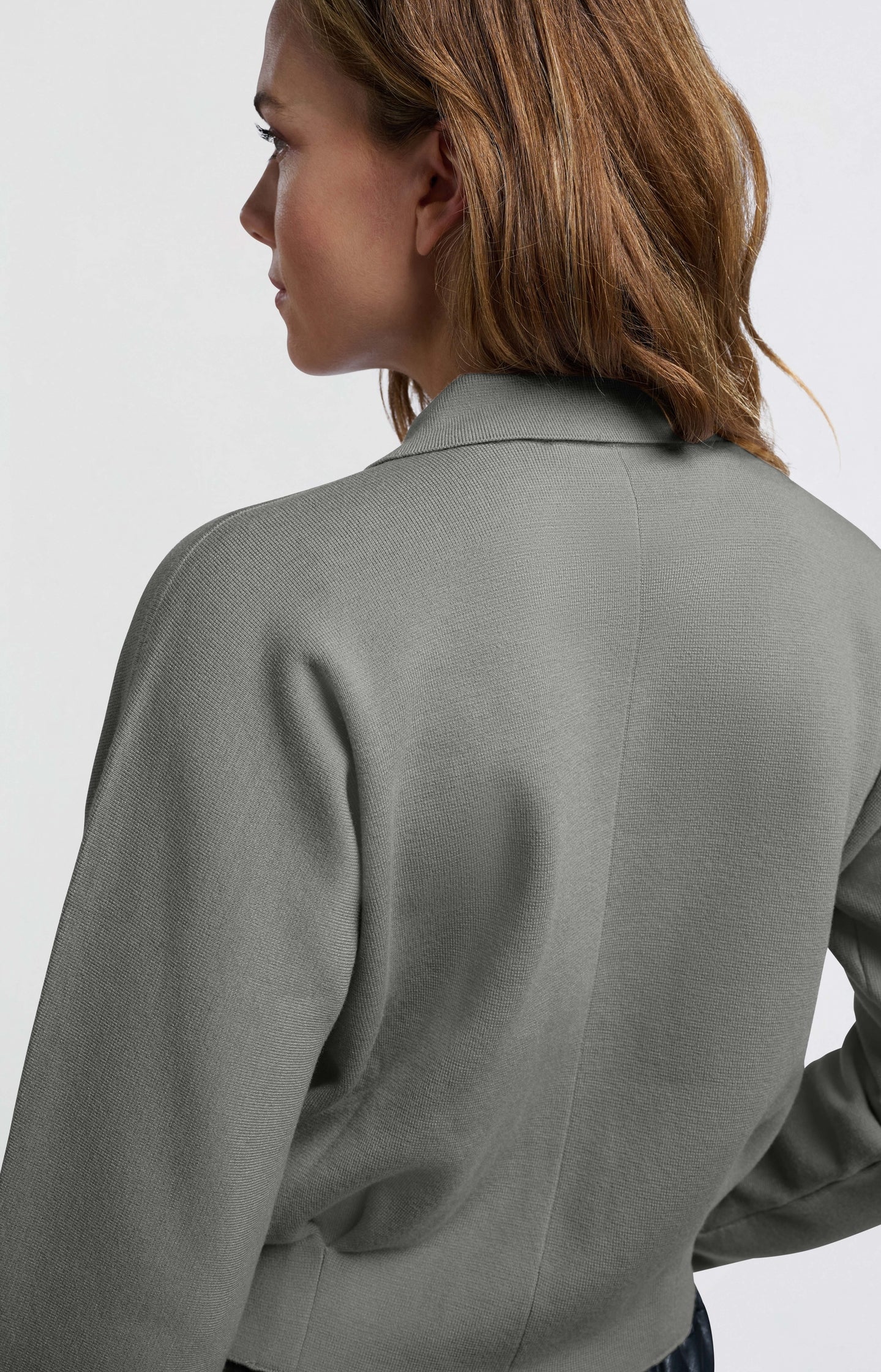 Light grey cardigan with long sleeves and hidden zipper